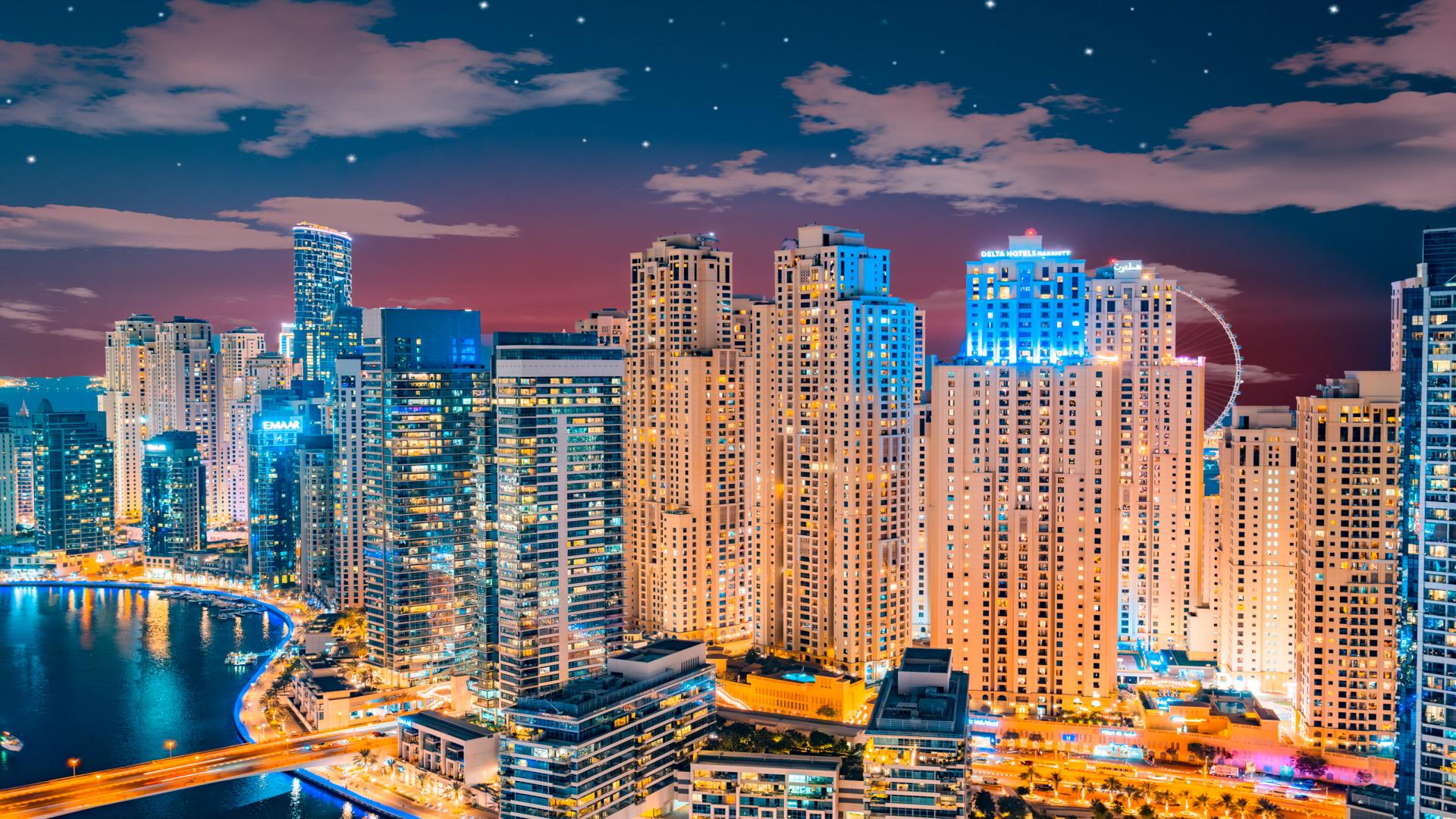 Stunning night view of Dubai Marina skyline and waterfront near JW Marriott Hotel