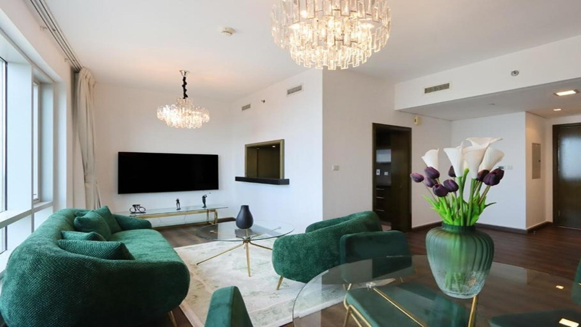 Modern living room in The Lofts Central, Downtown Dubai apartment with city views