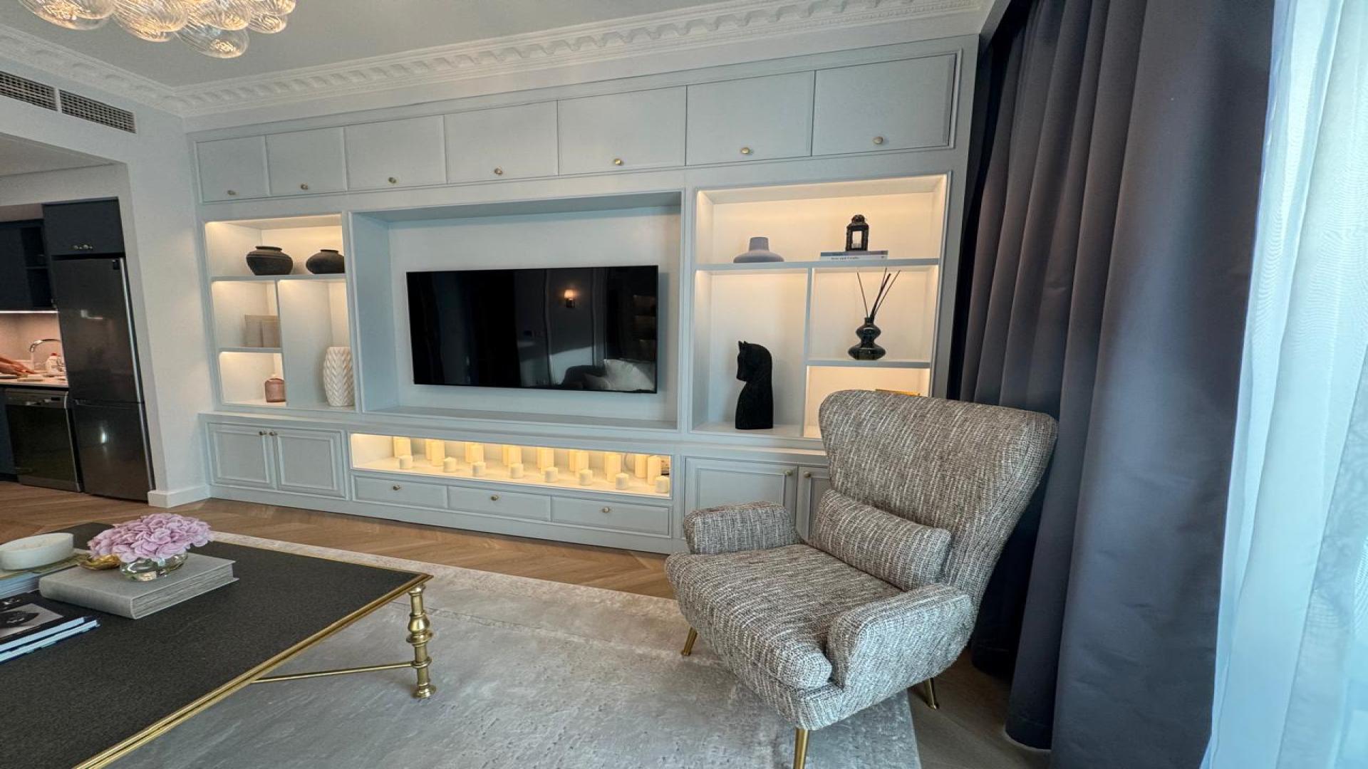 Luxurious living room with bespoke European interiors in Dubai Creek Harbour apartment for sale