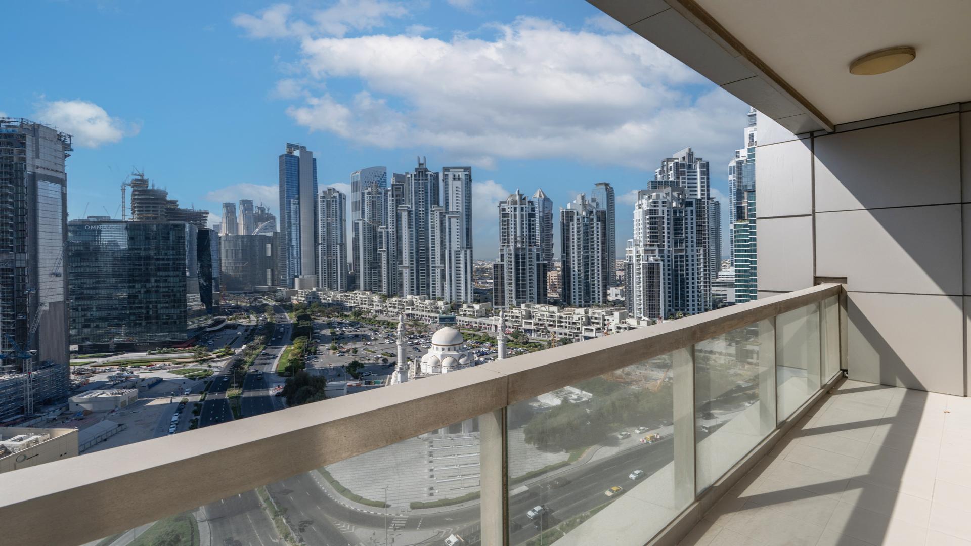 Empty apartment with large windows and city views in 8 Boulevard Walk, Downtown Dubai