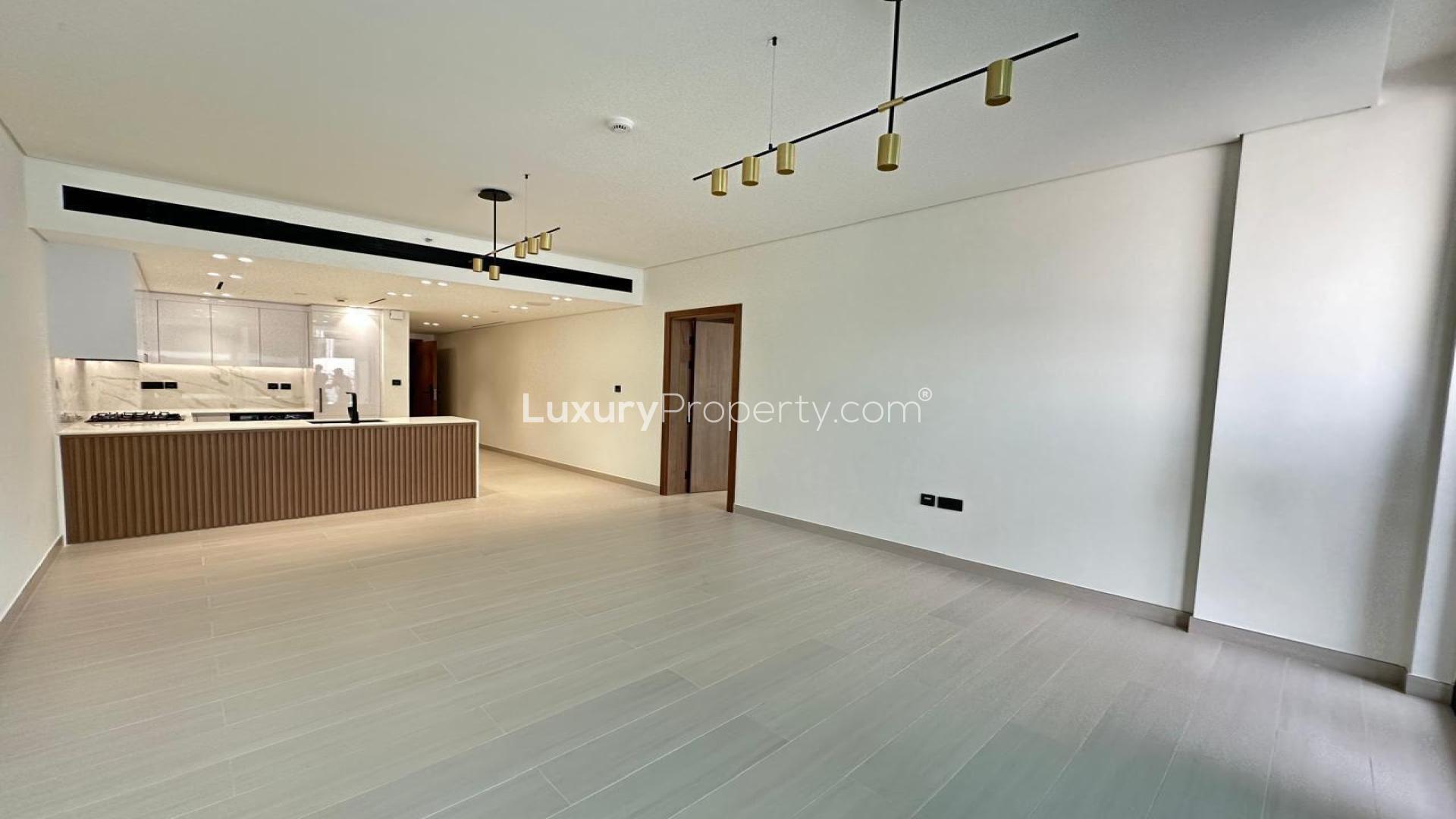 Unfurnished open-plan kitchen and living area in Binghatti Galaxy, JVC apartment for sale