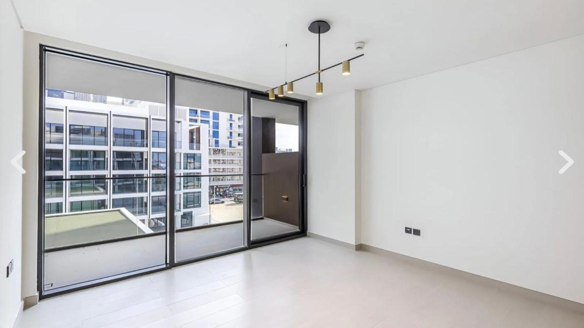 N/A,Unfurnished apartment with large windows in Binghatti Galaxy, JVC, available for sale