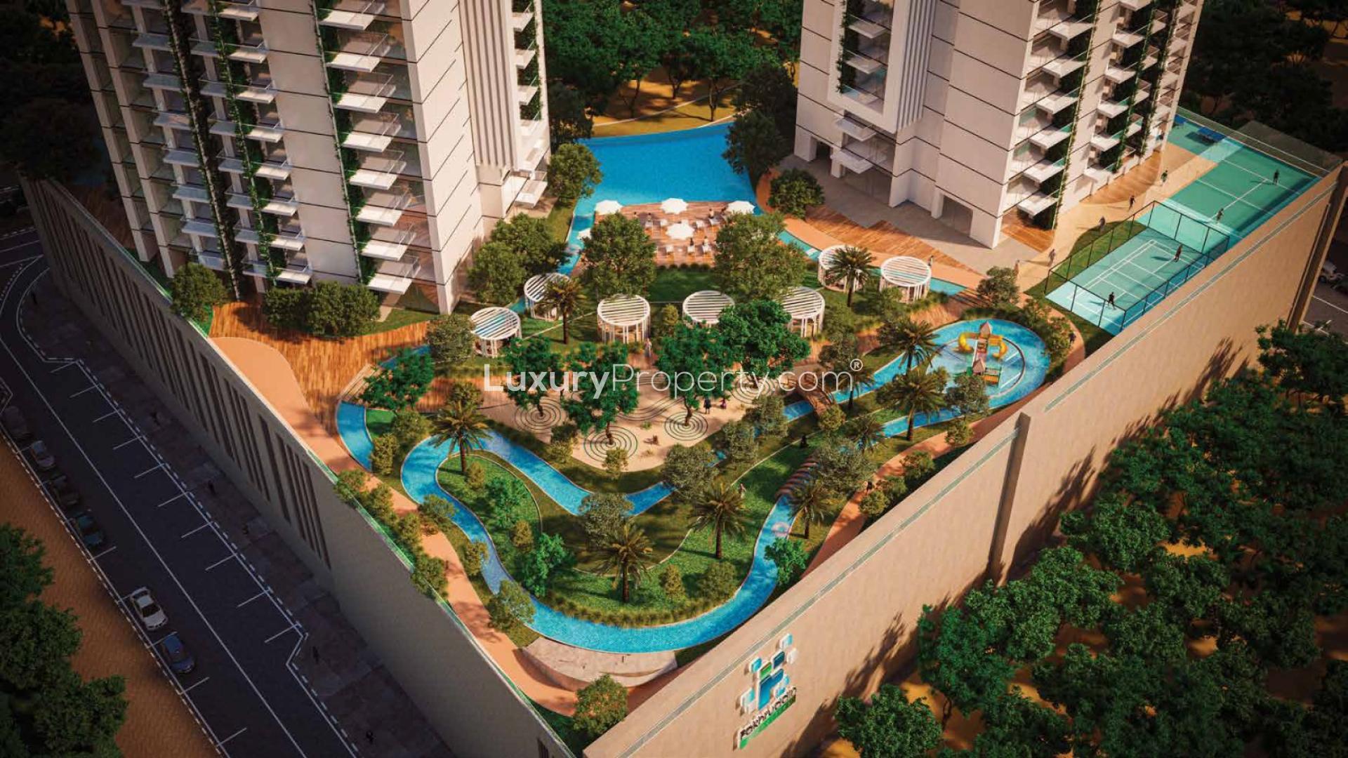 "Jumeirah Village Circle Maimoon Gardens apartment towers at sunset, genuine resale opportunity.",Aerial view of Maimoon Gardens amenities, Jumeirah Village Circle apartment for sale