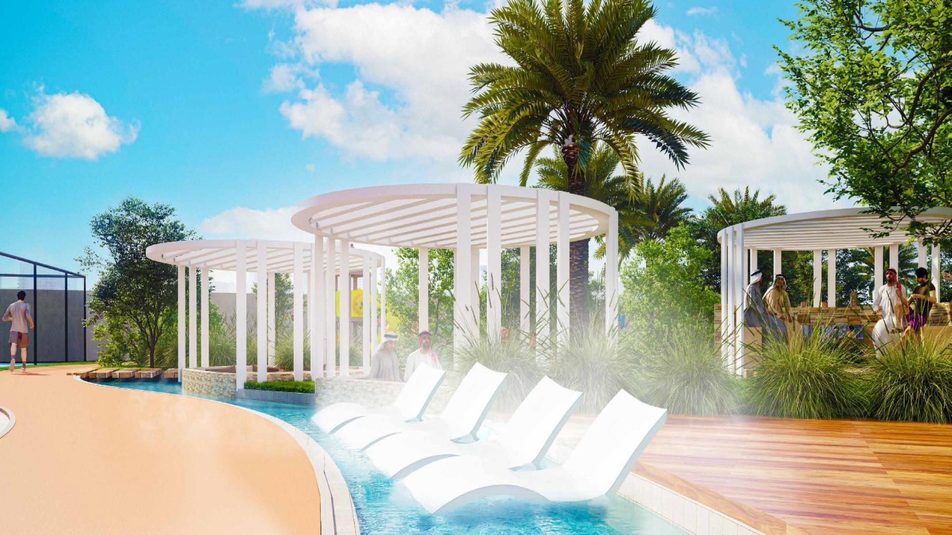 Luxurious poolside lounge area in Maimoon Gardens, Jumeirah Village Circle apartment for sale