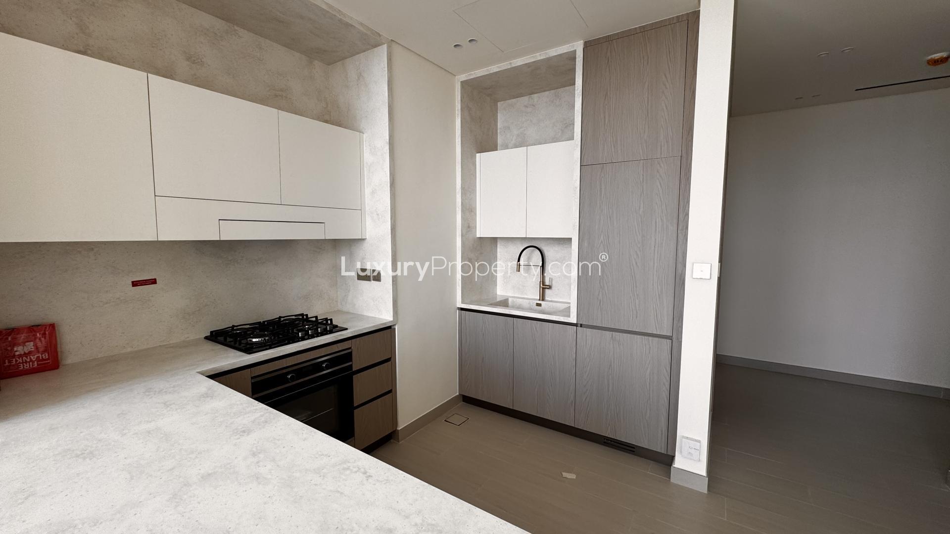 High-floor Binghatti Phantom apartment kitchen with city view, JVC, for sale