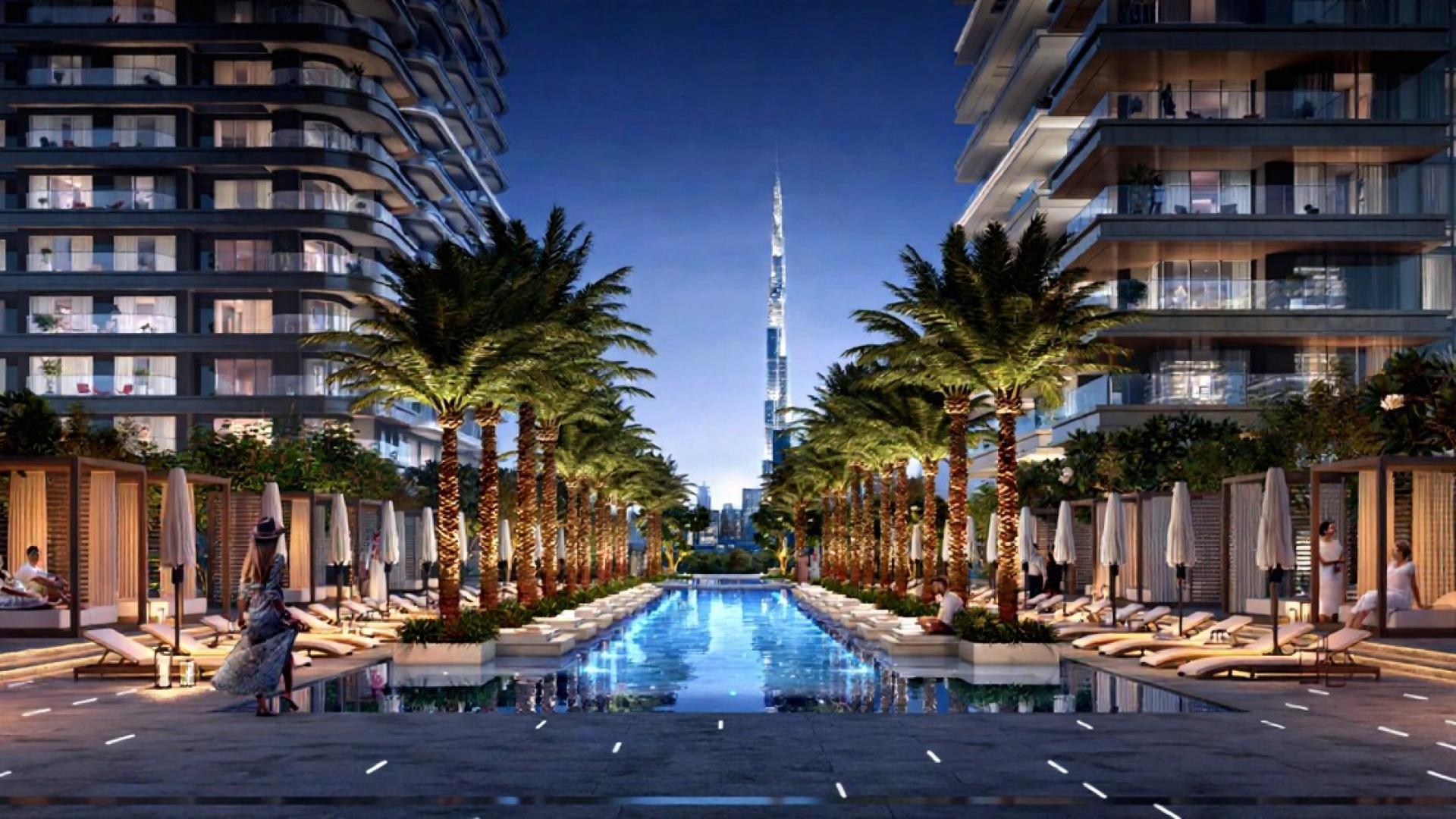 Luxurious poolside view at Address Residences Zabeel 3, DIFC, with Burj Khalifa backdrop