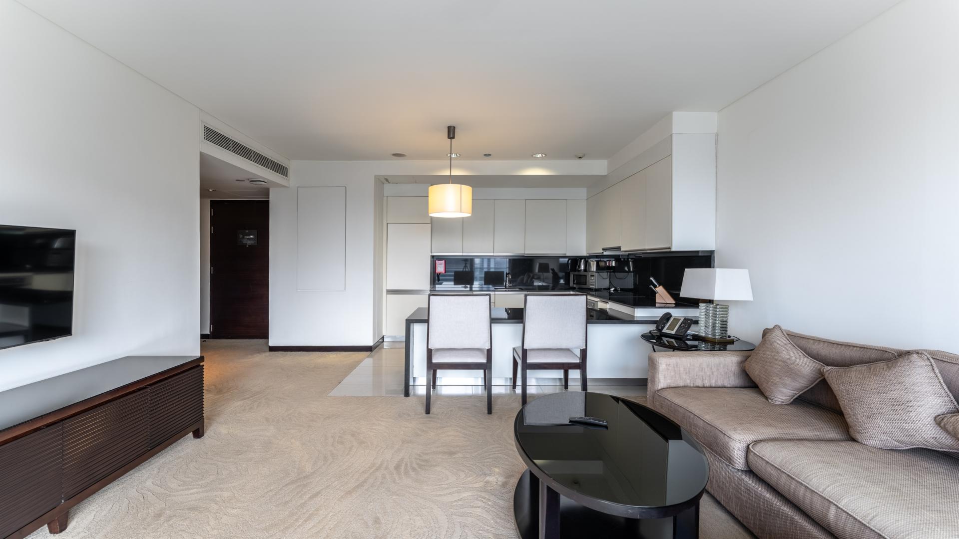 Modern kitchen and living area in Dubai Marina apartment for sale, JW Marriott Hotel Marina