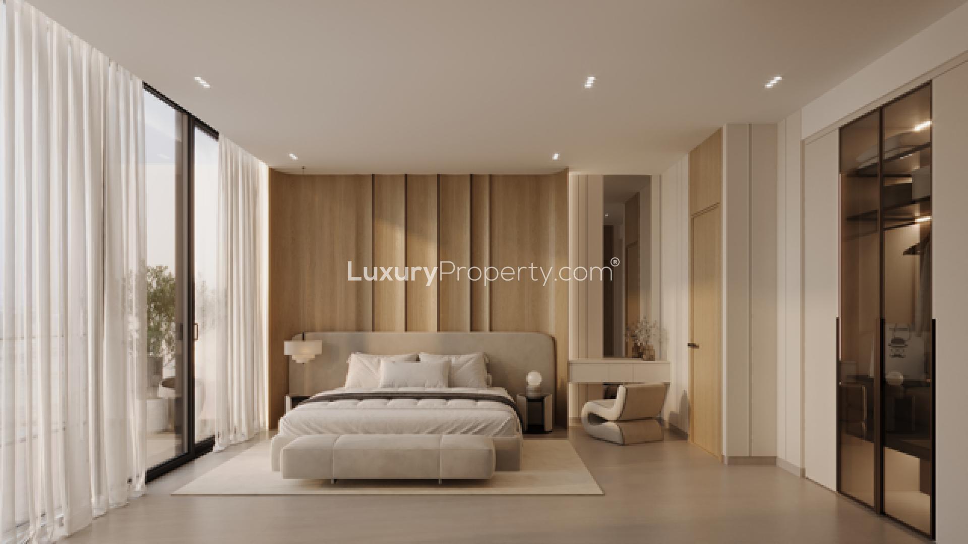 High-floor Dubai Sport City apartment with modern kitchen and city views