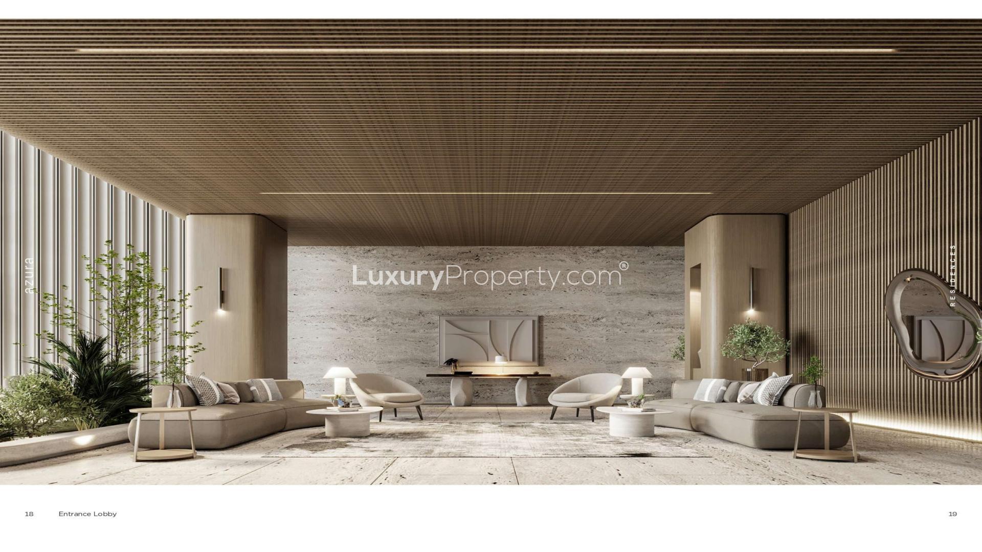 Aerial view of Azura Residences, Dubai Islands, featuring waterfront and lush greenery