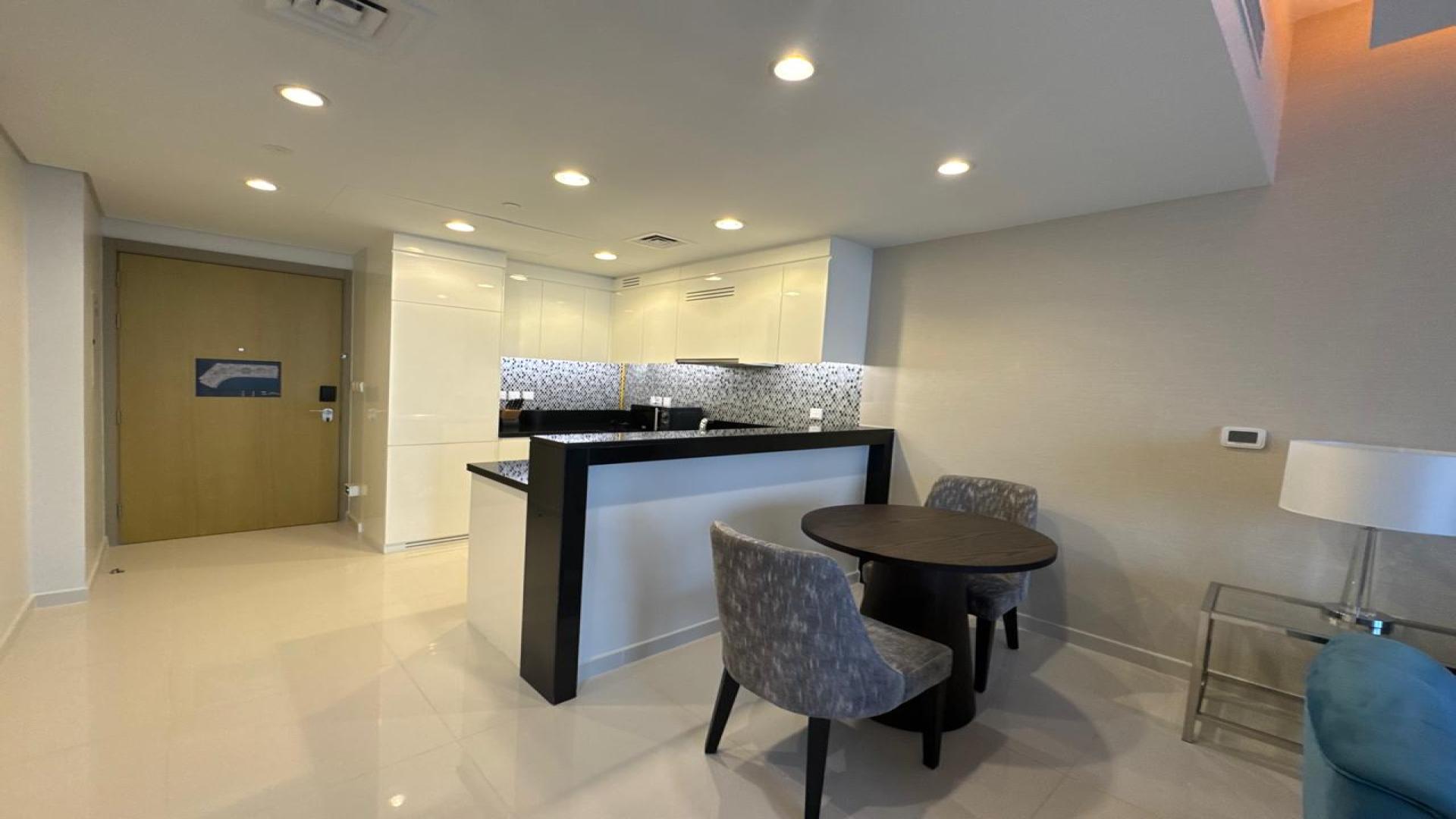 Modern furnished kitchen and dining area in Aykon City Tower B, Business Bay apartment
