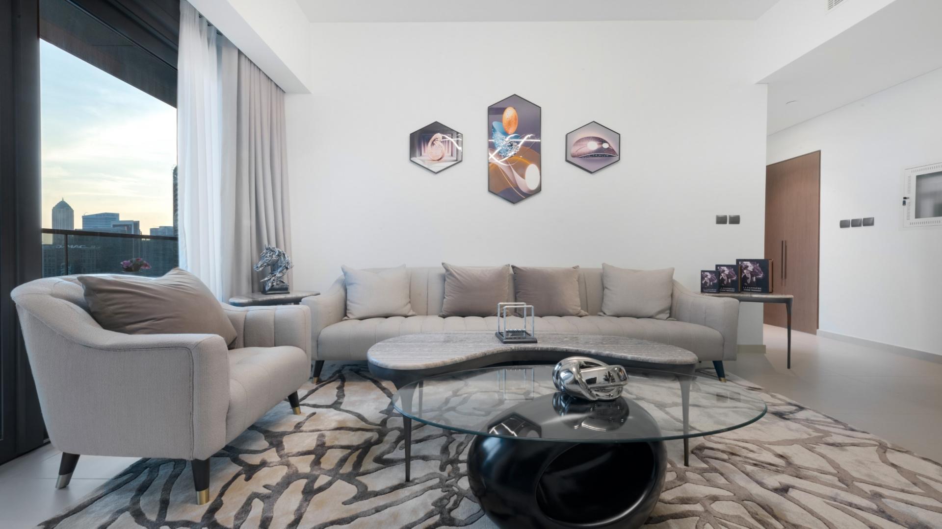 Fully furnished living room in Act Towers apartment, Downtown, for sale. Ref: LP48582