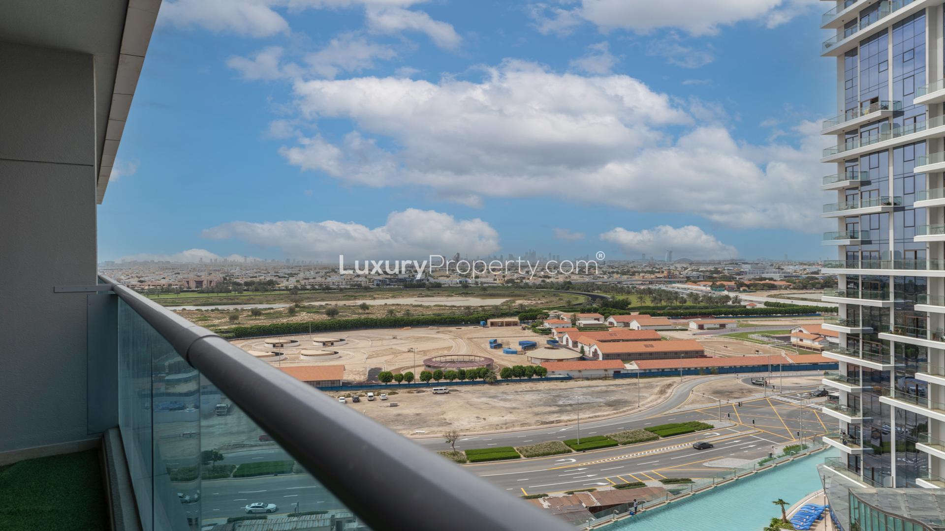"Stunning view from Elite Business Bay apartment balcony in Business Bay, Dubai skyline visible.",Spacious balcony view in Elite Business Bay apartment for sale, ideal investment opportunity