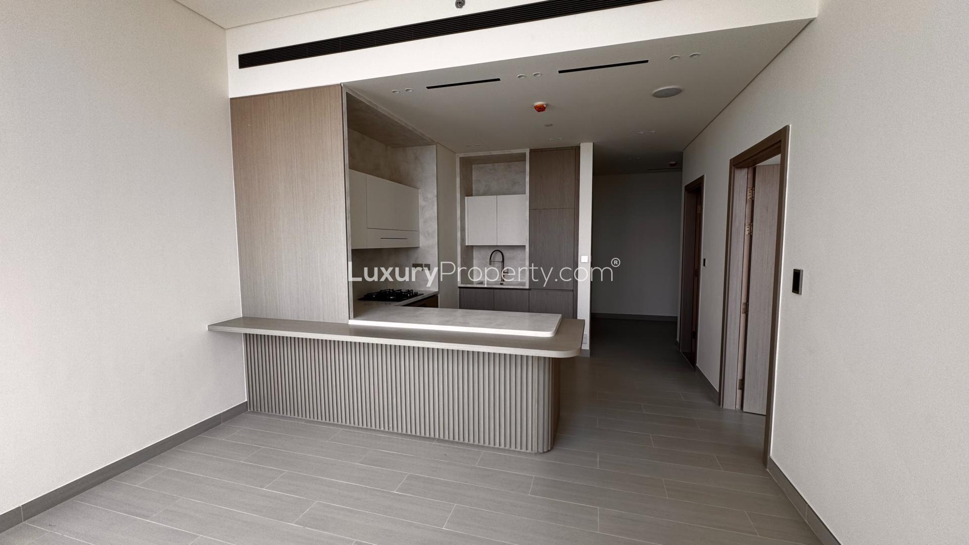 Modern apartment lobby with elegant seating area in Binghatti Phantom, JVC community