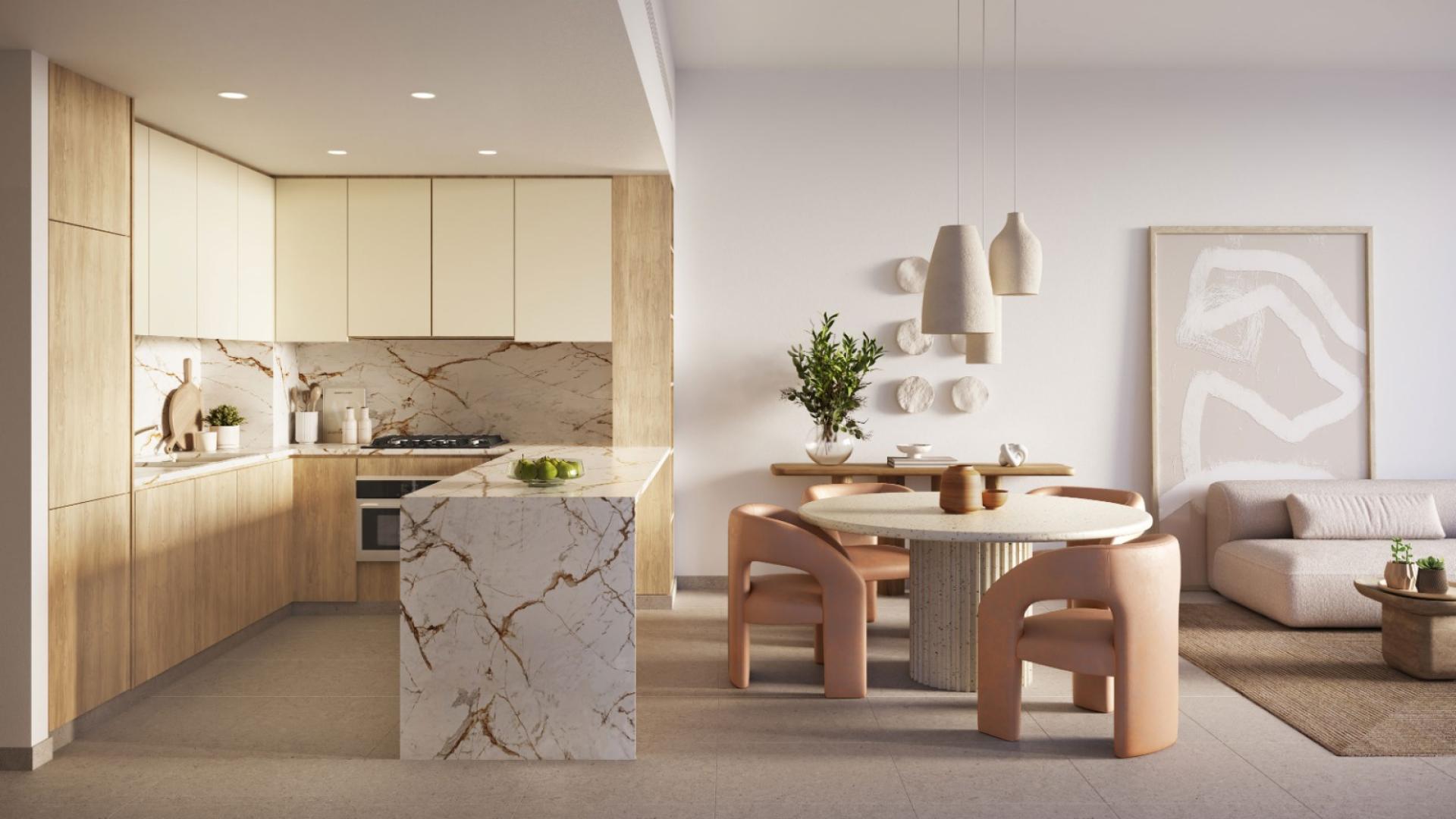 Modern living room in Ghaf Woods apartment, featuring stylish furniture and natural light