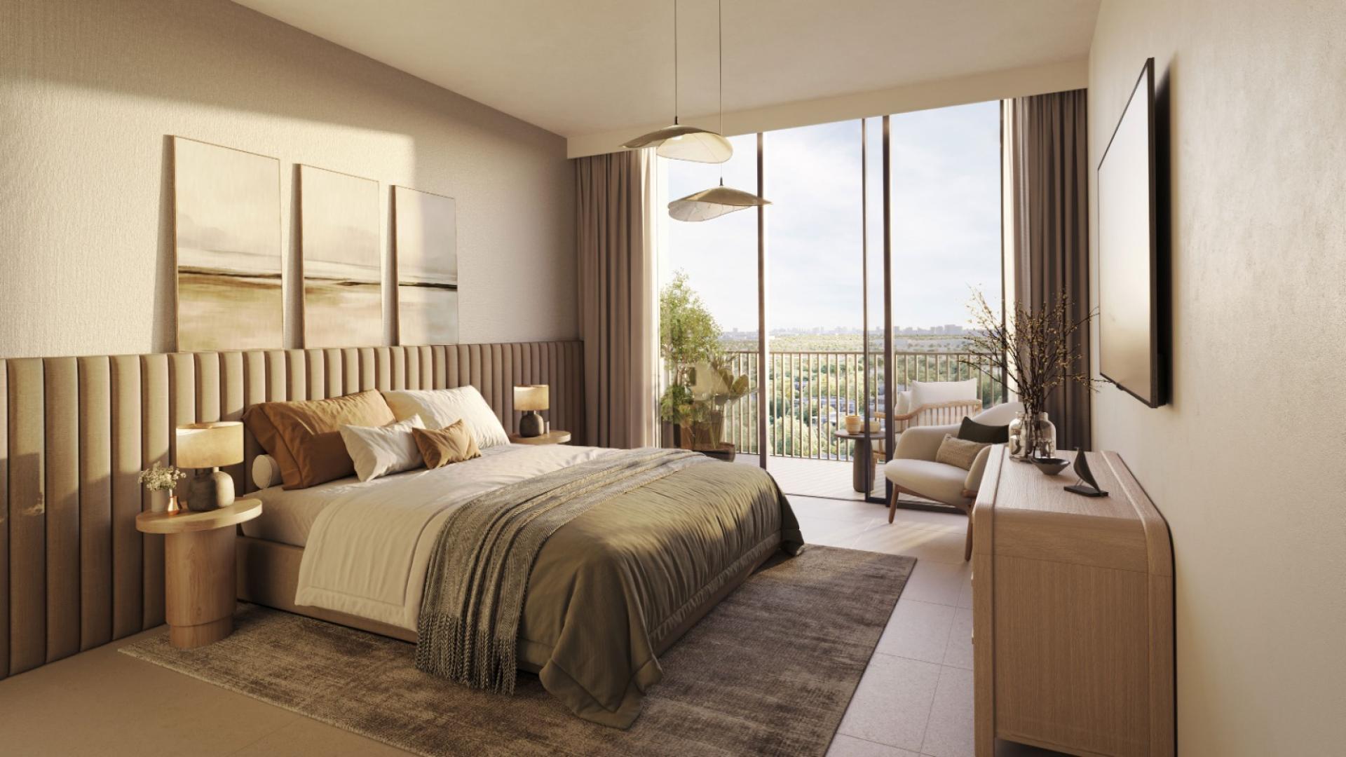 Modern apartment lounge in Ghaf Woods, DISTRIKT with stylish seating and large windows