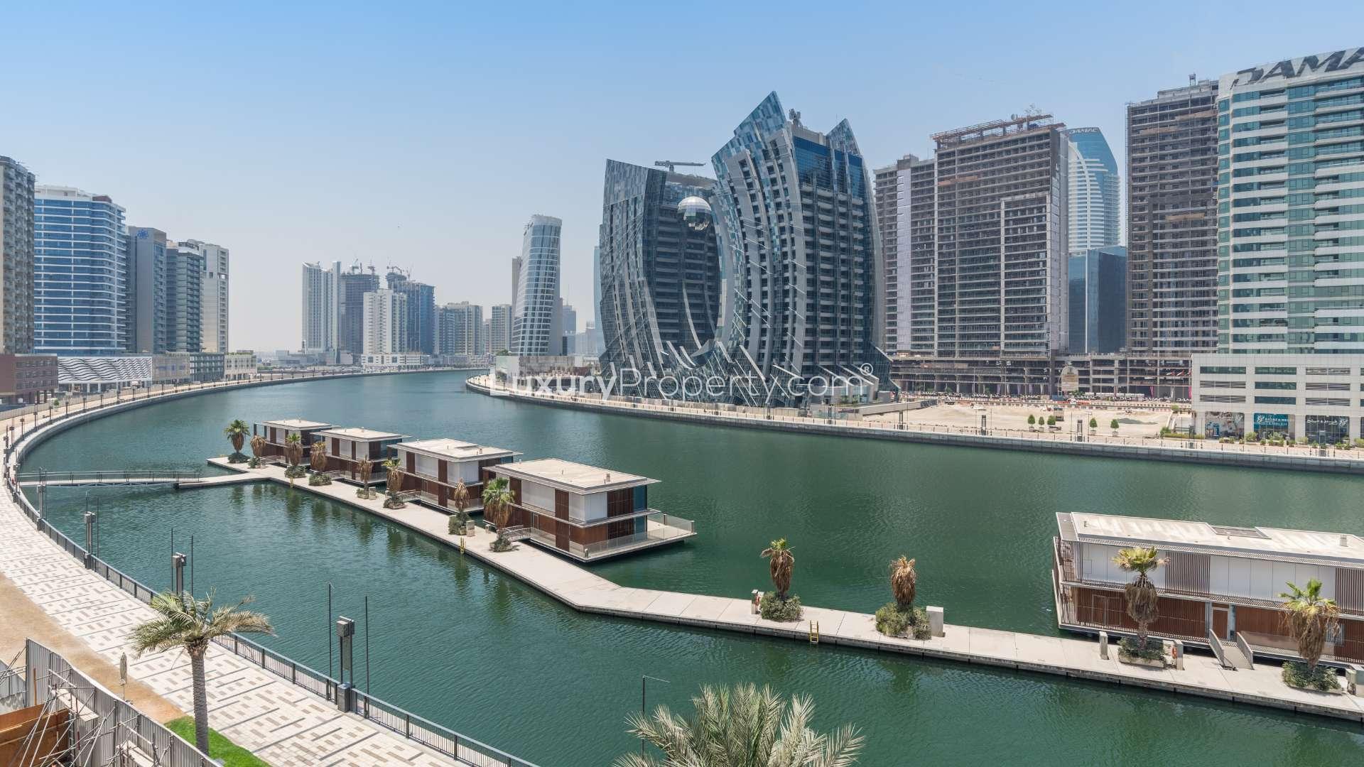Modern kitchen and dining area in one-bedroom apartment, Business Bay, Dubai Canal views