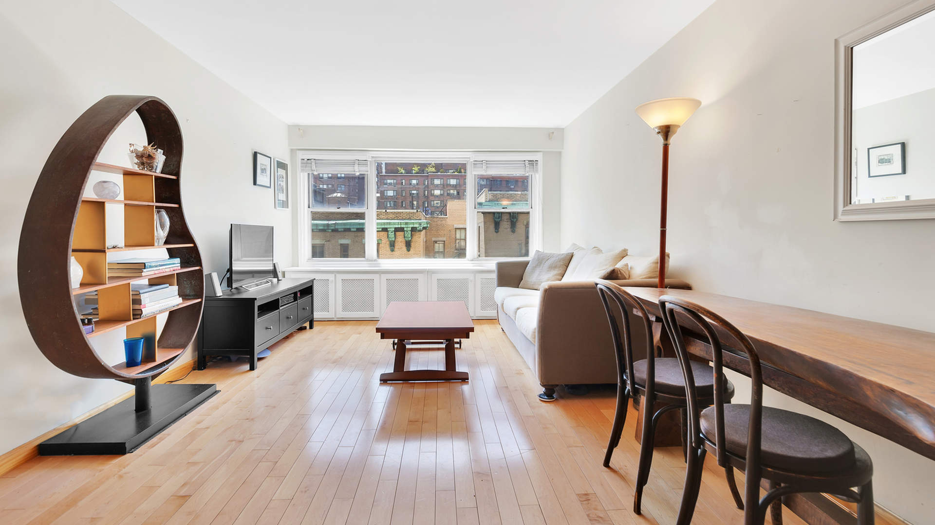 View of Manhattan skyline from modern apartment at 435 East 65th Street, New York