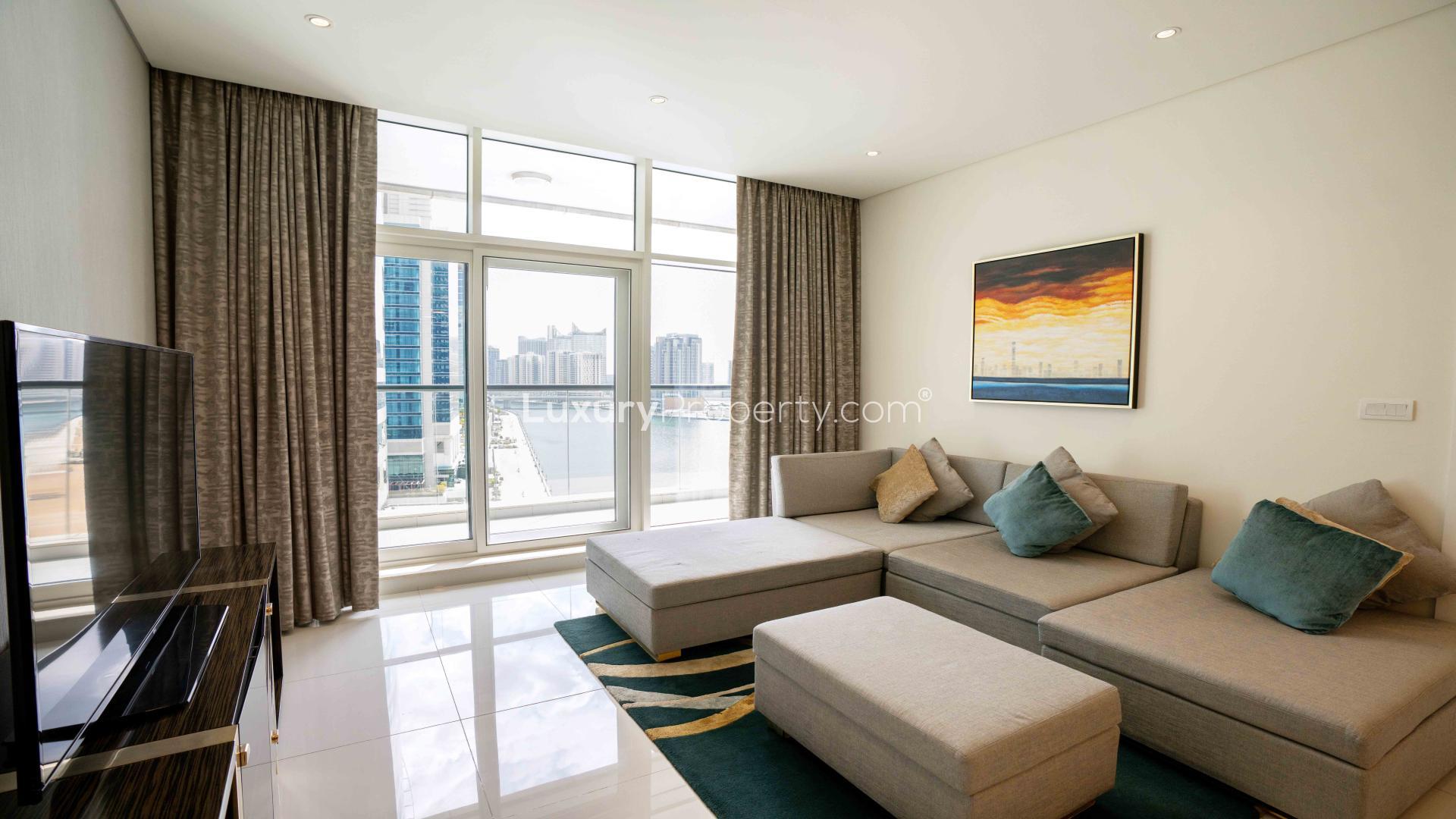 Balcony view from Bays Edge apartment overlooking Business Bay waterfront and cityscape