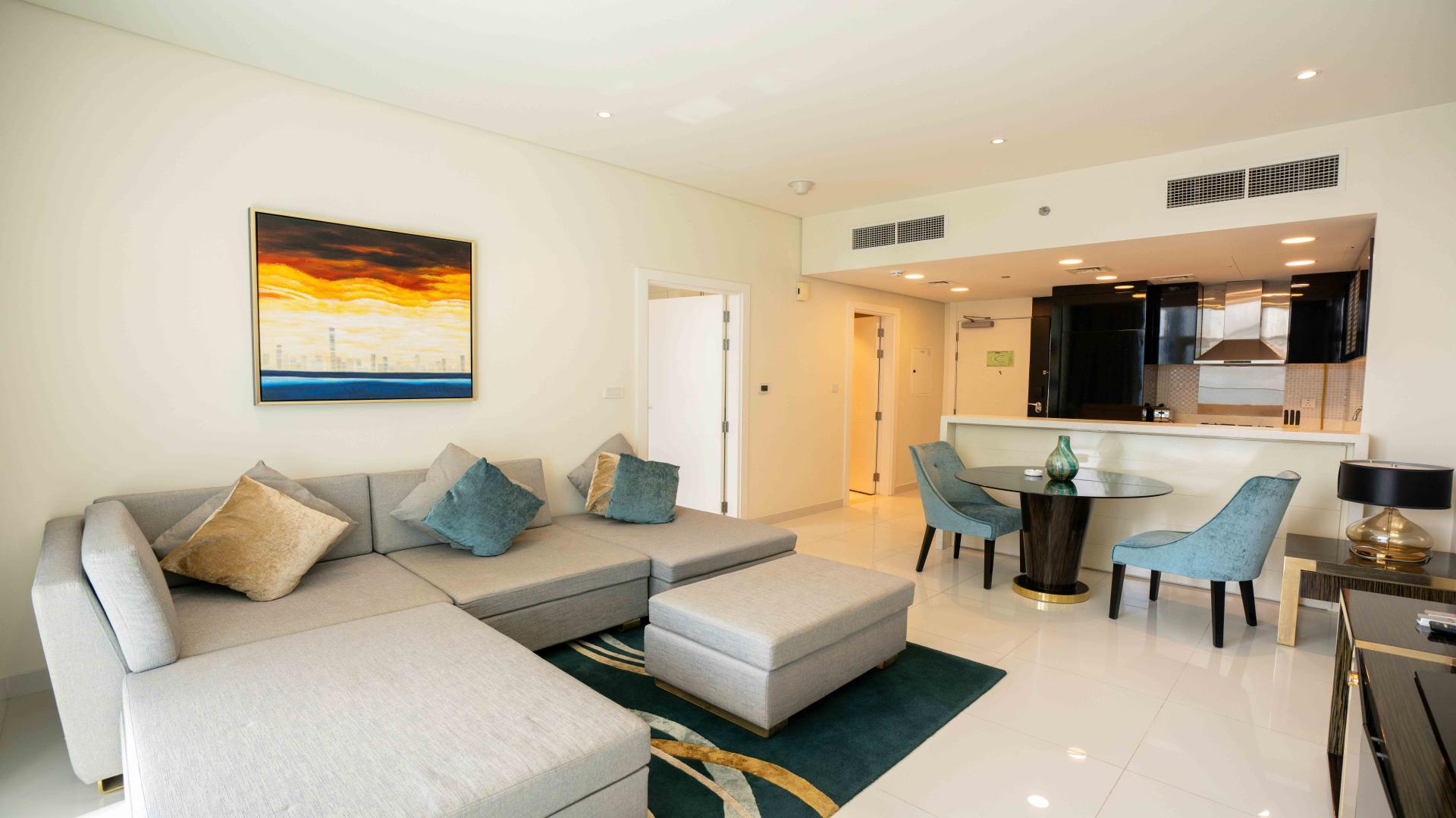 Balcony view from 1-bedroom apartment in Bays Edge, Business Bay, showcasing cityscape and skyscrapers