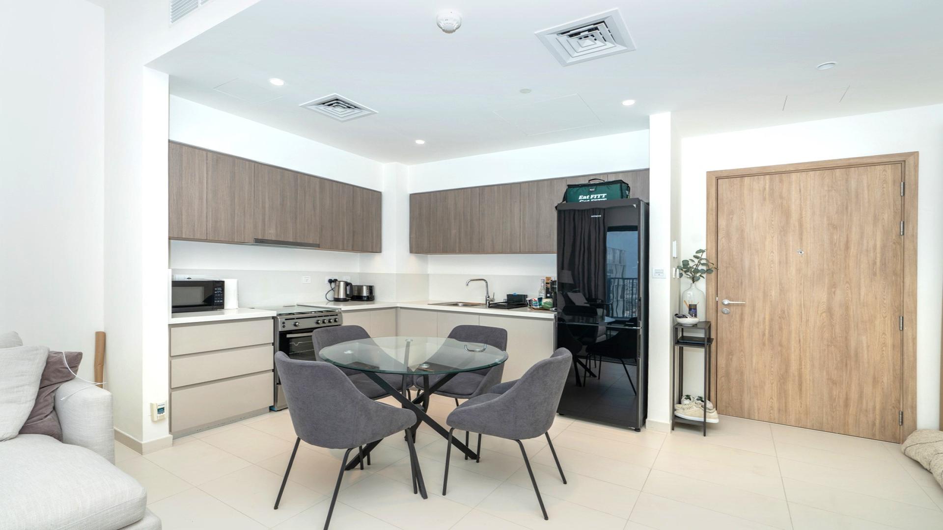 Modern living room and kitchen in 1-bed apartment, Park Ridge, Dubai Hills Estate