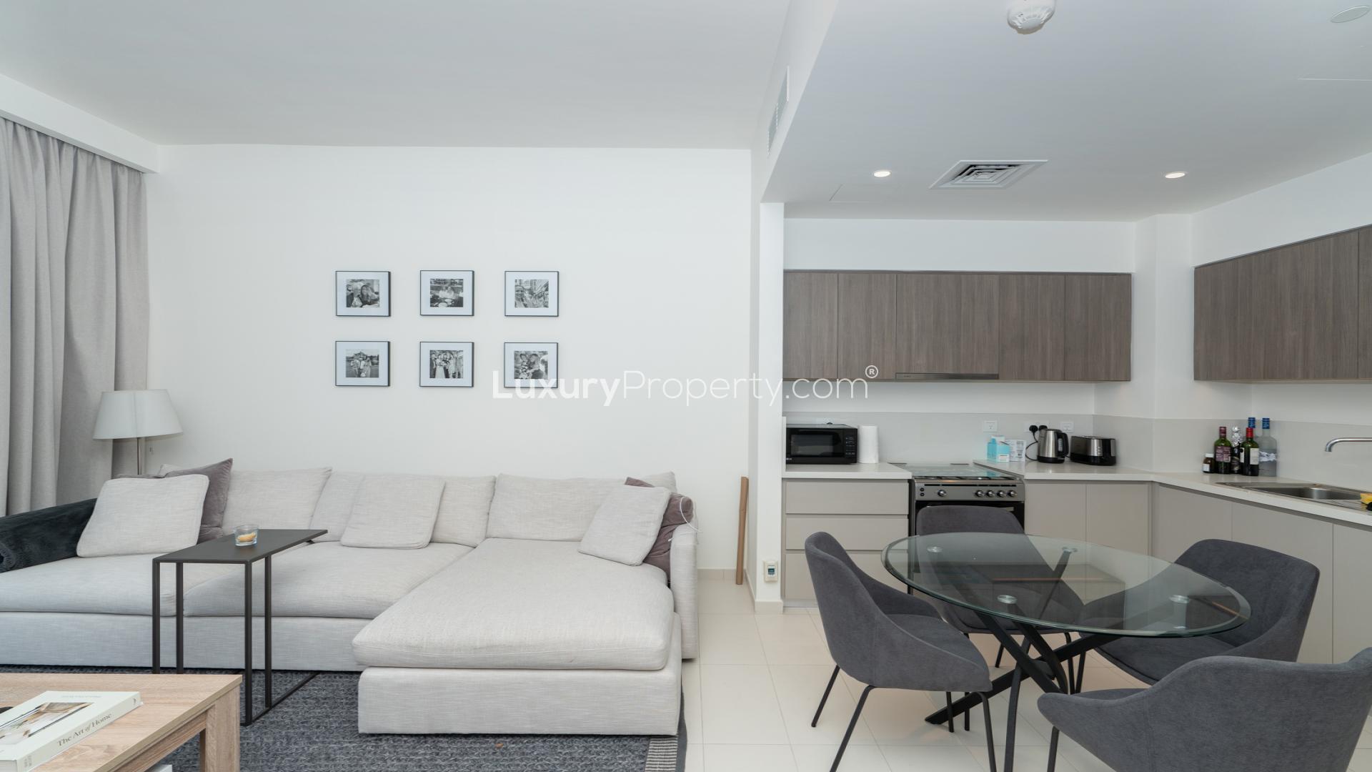 Modern living room and kitchen in 1-bedroom apartment, Park Ridge, Dubai Hills Estate