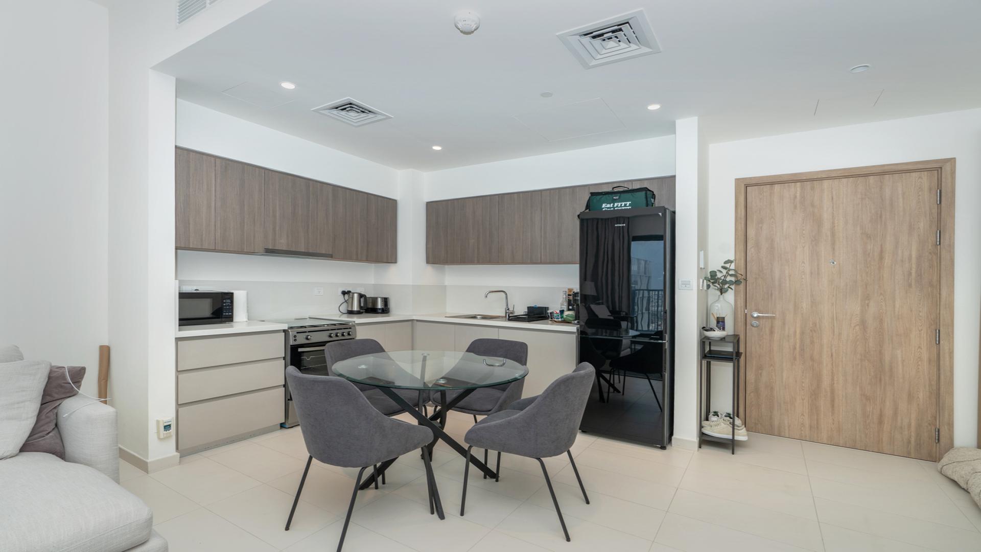 Modern kitchen and dining area in 1-bedroom apartment, Park Ridge, Dubai Hills Estate