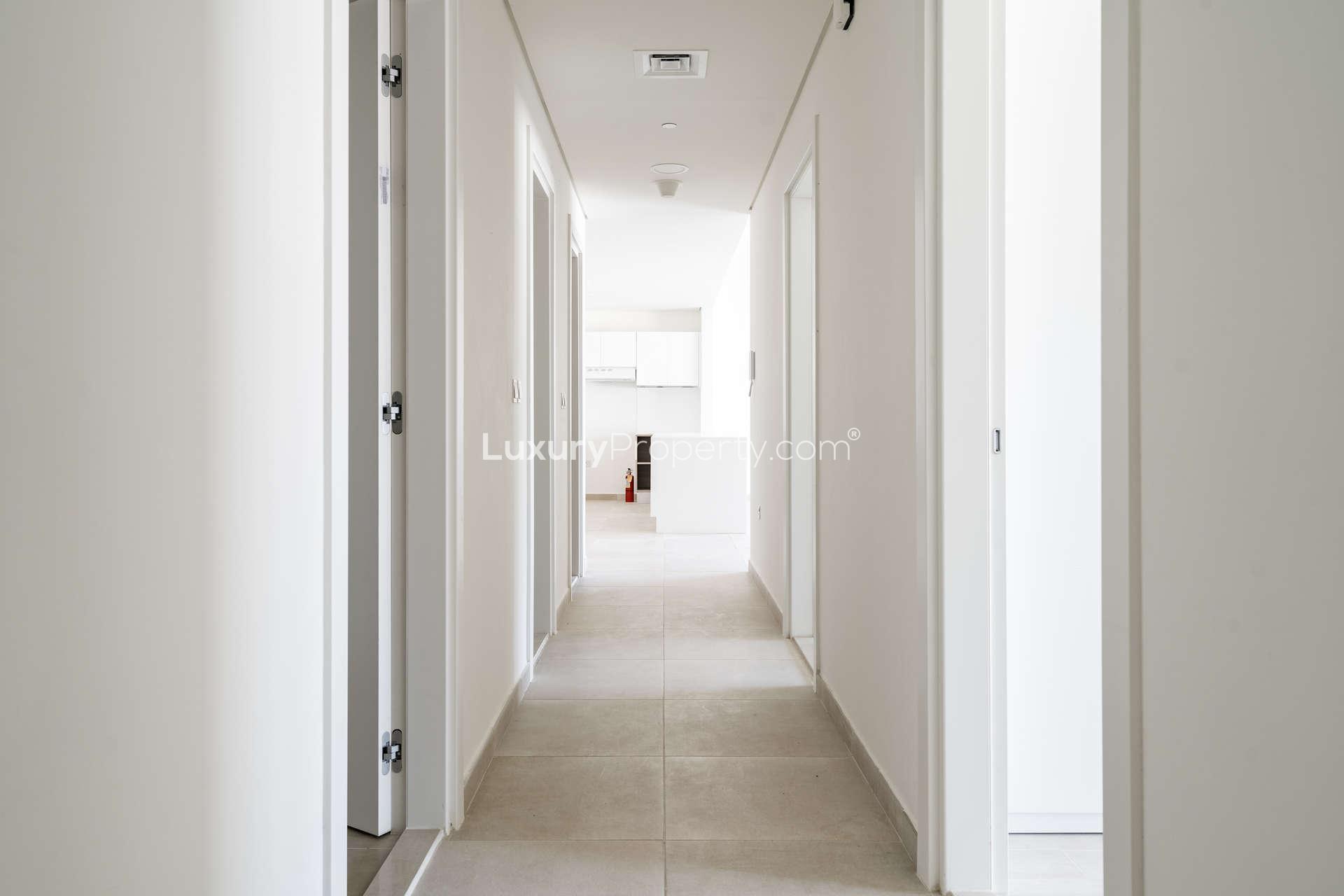 Modern bathroom sink in 1-bedroom Alandalus apartment, Jumeirah Golf Estates