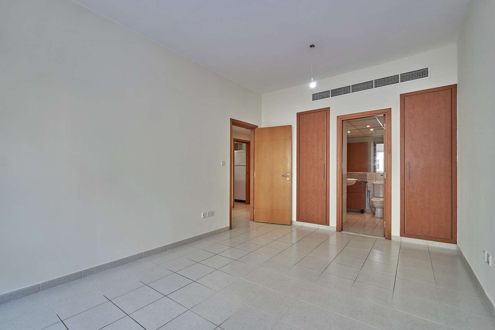 Exterior view of Al Ghozlan apartment buildings in The Greens community, Dubai