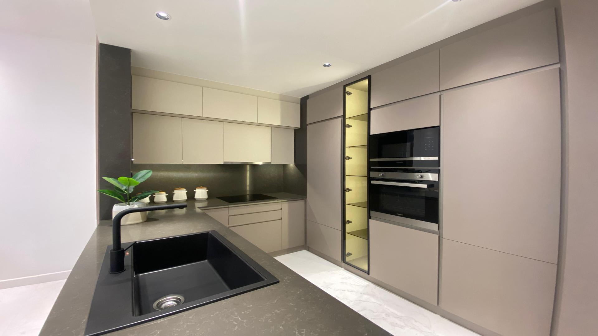 High-floor Aeternitas Tower apartment kitchen and dining area in Dubai Marina for sale