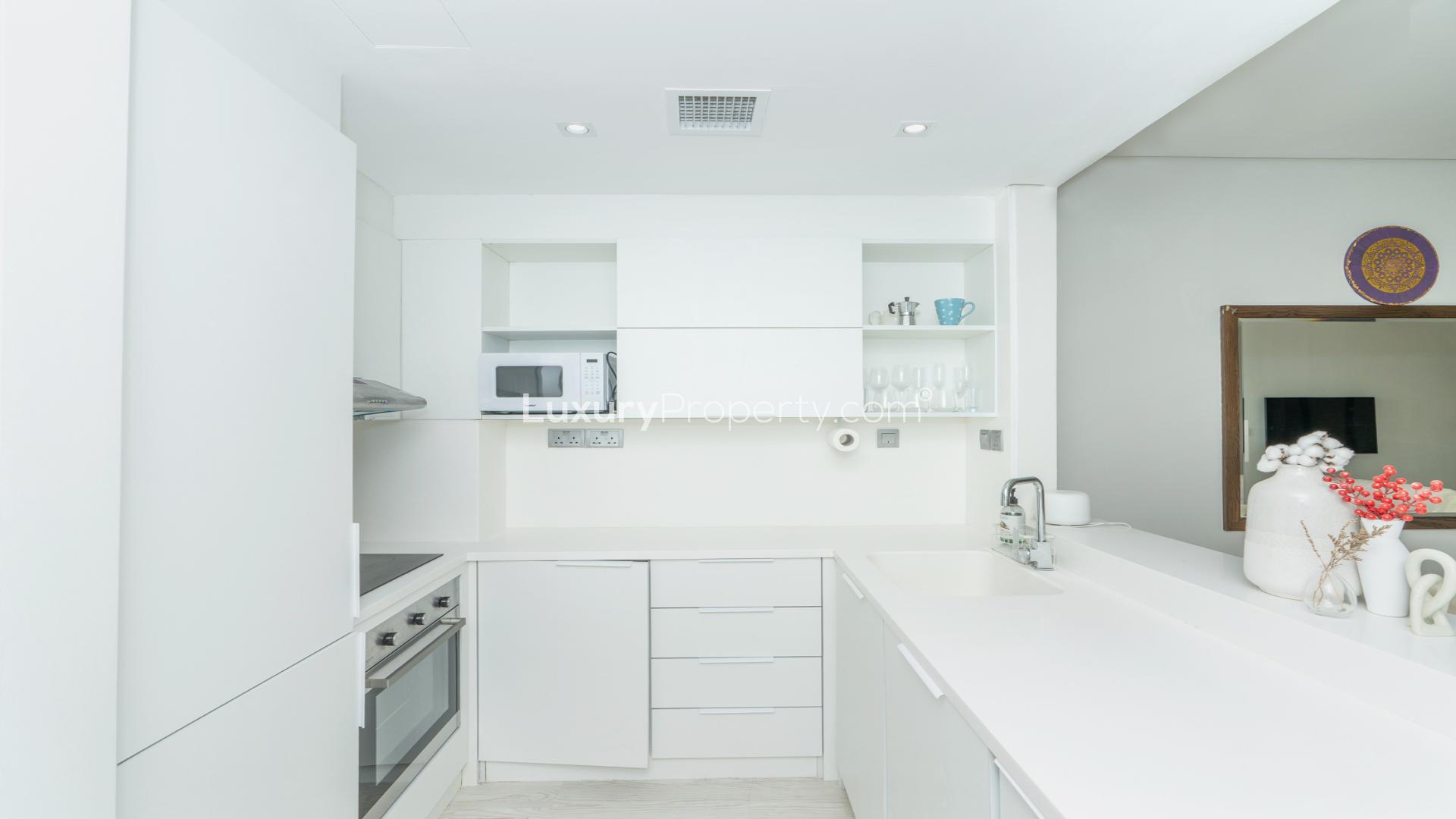 Elegant dining area in 1-bedroom apartment, The Royal Amwaj, Palm Jumeirah, for sale