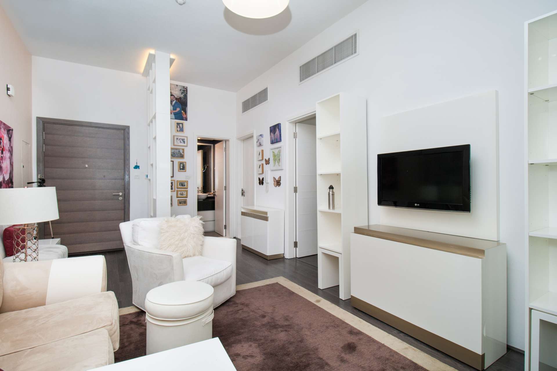 Living room in fully upgraded 1-bedroom apartment, J5 Al Sufouh Gardens, modern interior