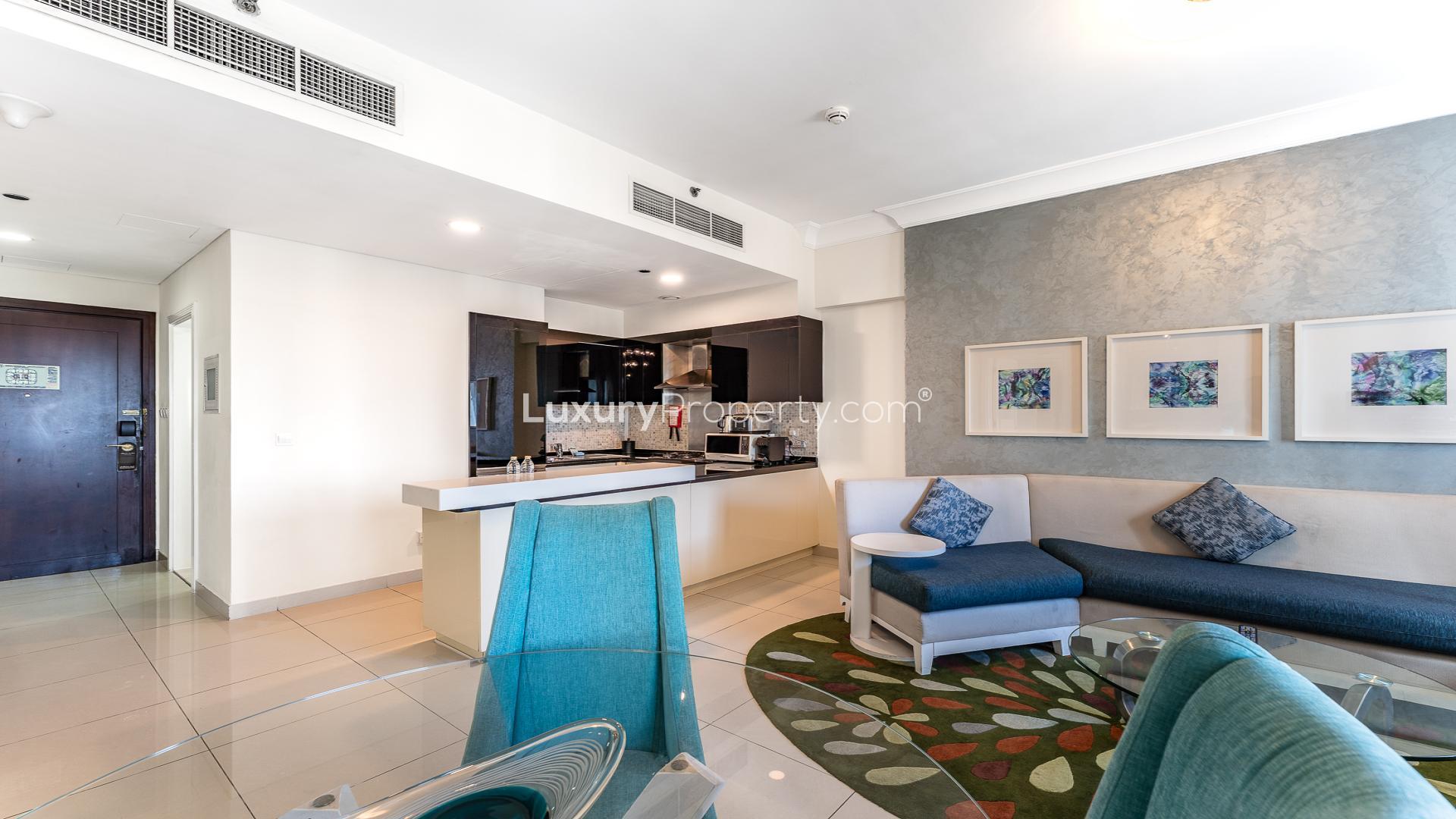 Furnished living room and kitchen in Damac Maison, Downtown Dubai apartment for sale