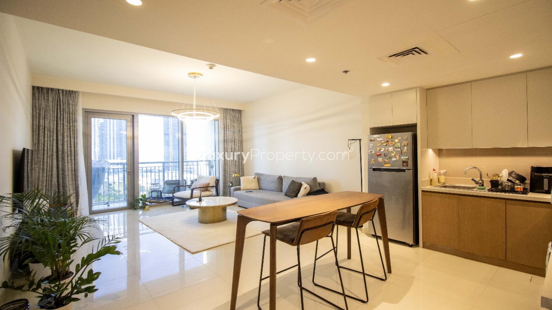 Balcony view from Harbour Views 1 apartment, Dubai Creek Harbour, showcasing skyline and greenery