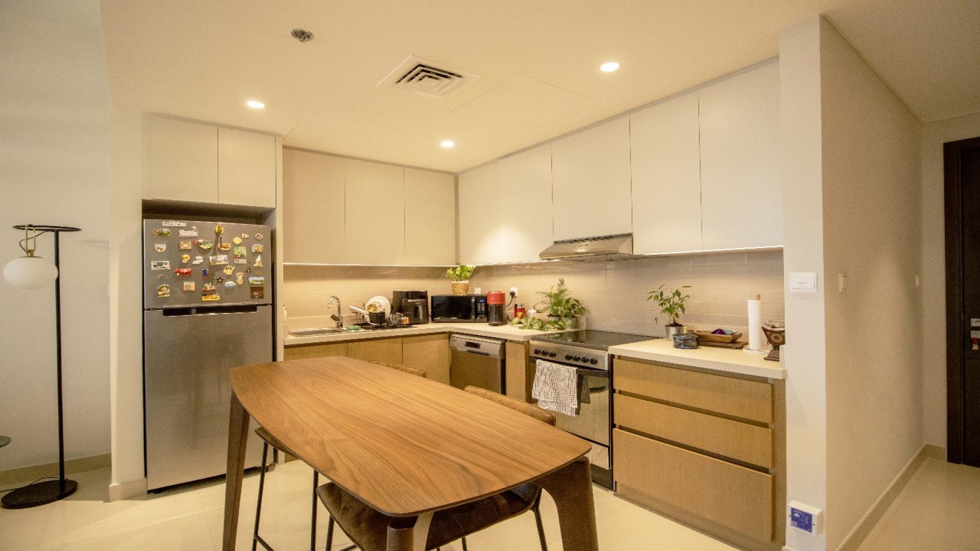 Furnished living room and kitchen in Harbour Views 1 apartment, Dubai Creek Harbour