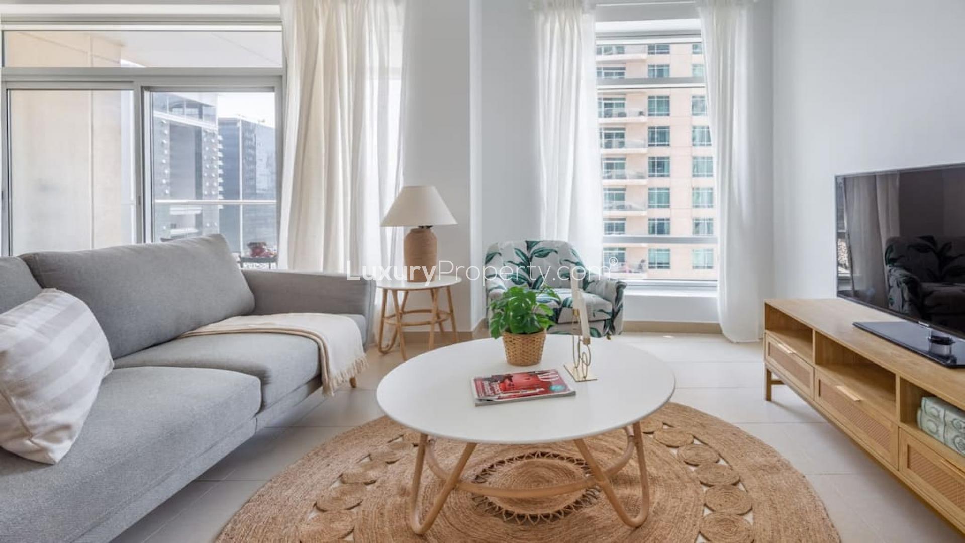 Furnished living room with dining area in Burj Views apartment, Downtown Dubai