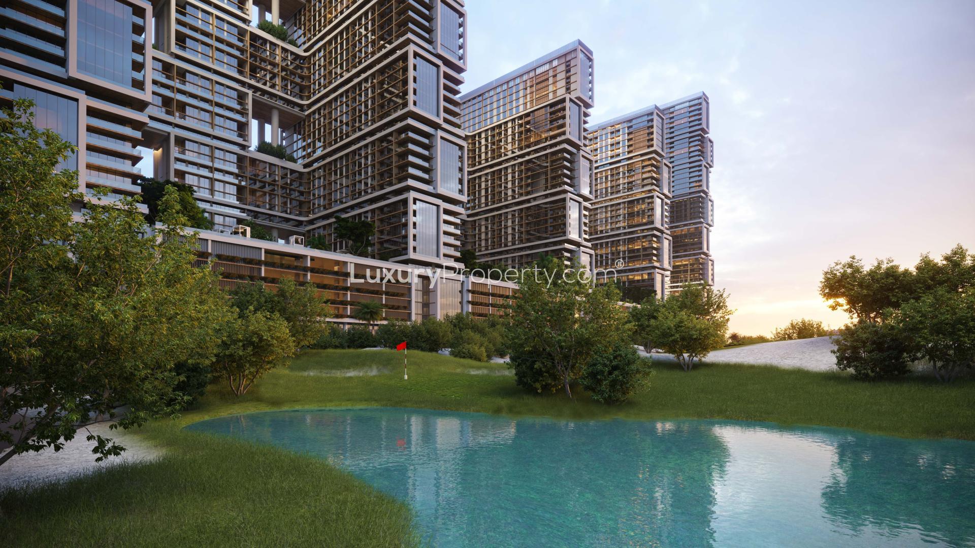 Elegant open-plan living room in Sobha Hartland apartment, overlooking Dubai Creek, modern furnishings