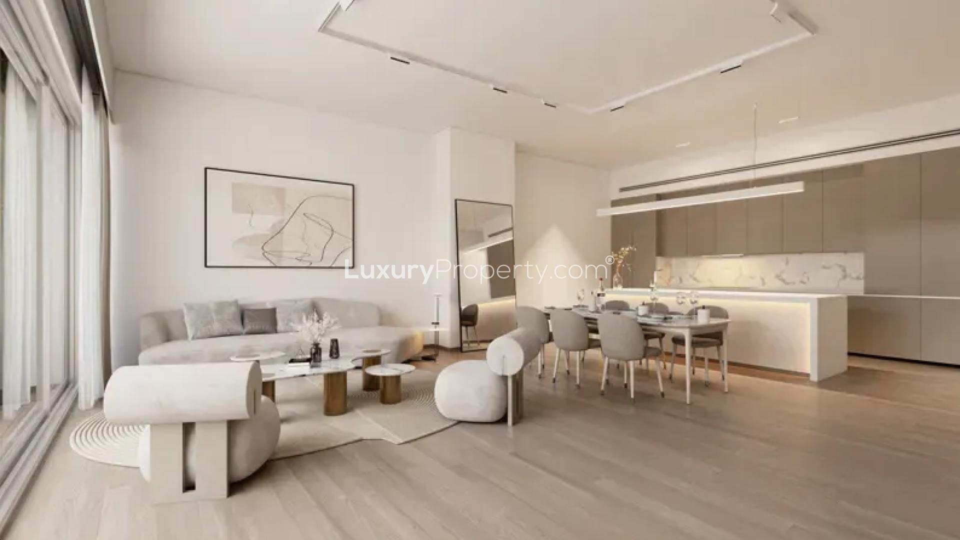 Modern open-plan kitchen and living area with panoramic city views in Crest Grande apartment