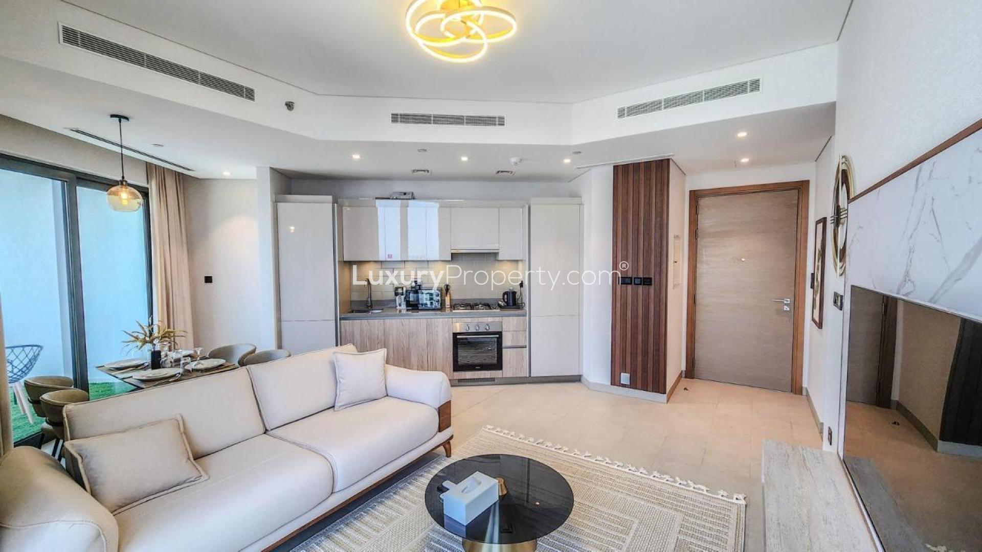 Modern bedroom in Sobha Hartland apartment, featuring large window with city view