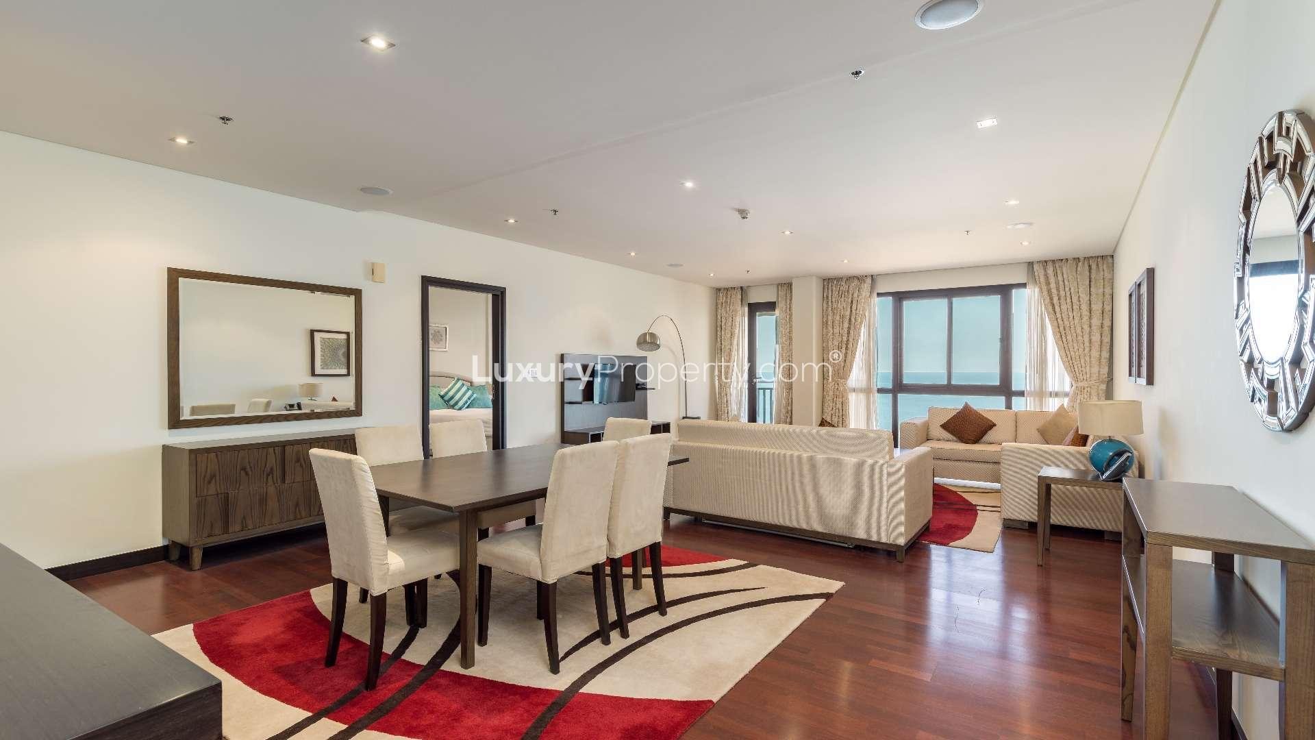Spacious living and dining area in Palm Jumeirah apartment, Anantara Residences, for sale