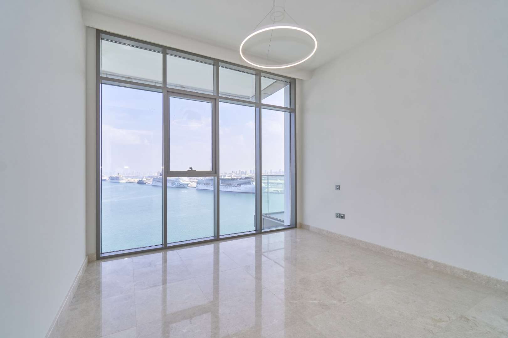 Modern living room with sea view in Anwa, Dubai Maritime City apartment for sale