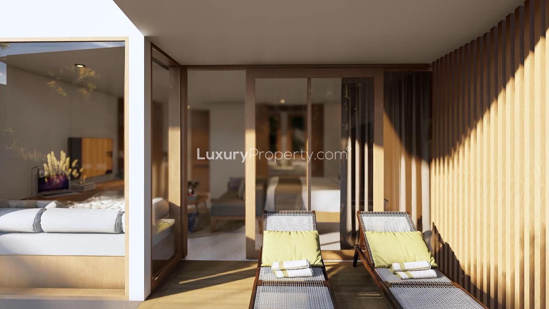 1-Bedroom Lagoon Suite at Cocana Resort, Bali with poolside view and modern interiors