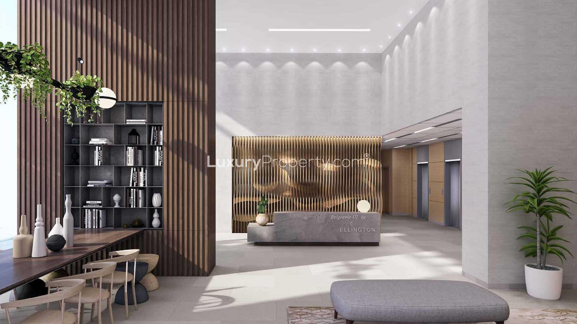 Modern bedroom in luxury apartment at Belgravia 3, Jumeirah Village Circle, with balcony view