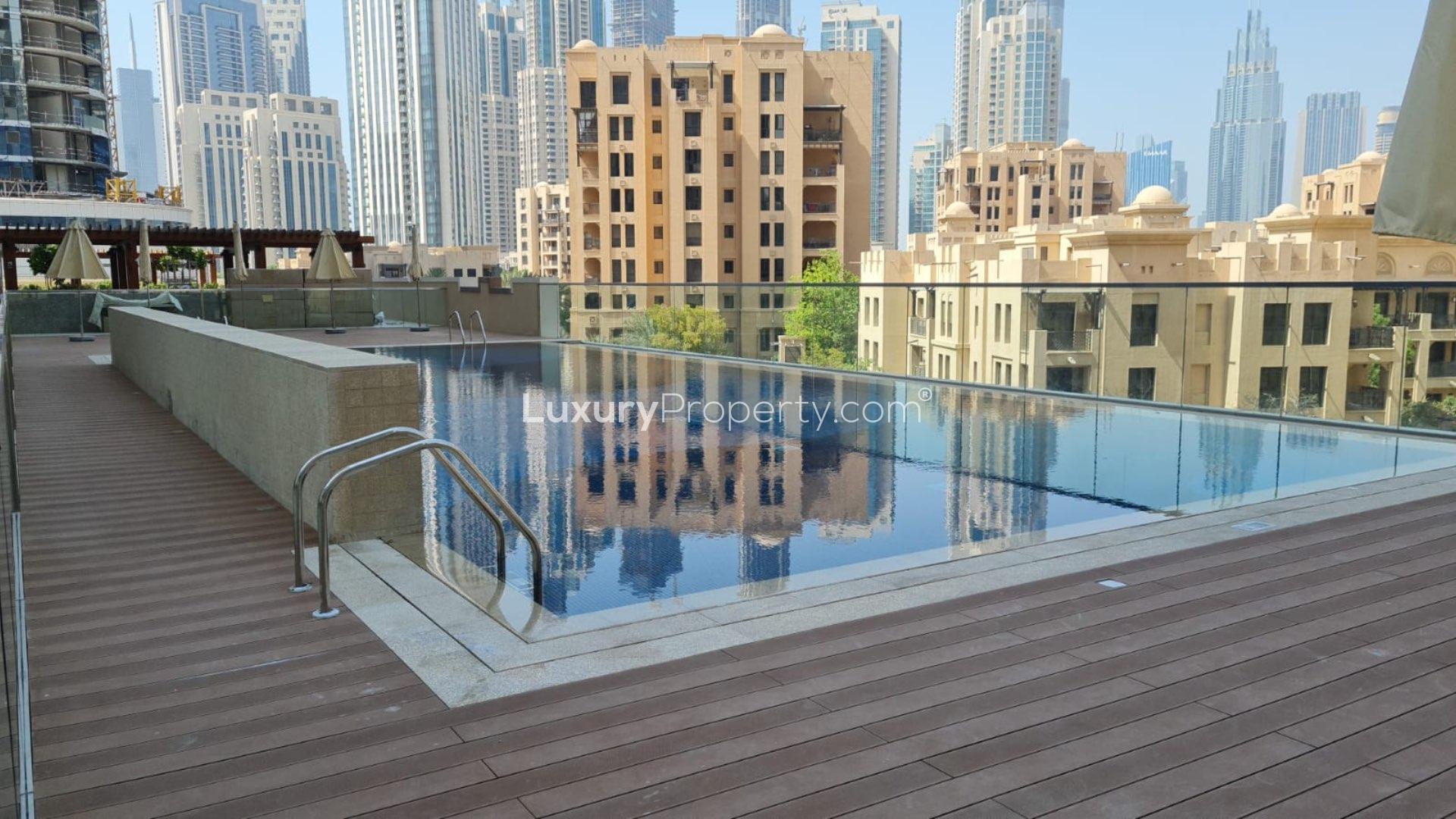 Modern one-bedroom apartment interior with large windows in Bellevue Towers, Downtown Dubai