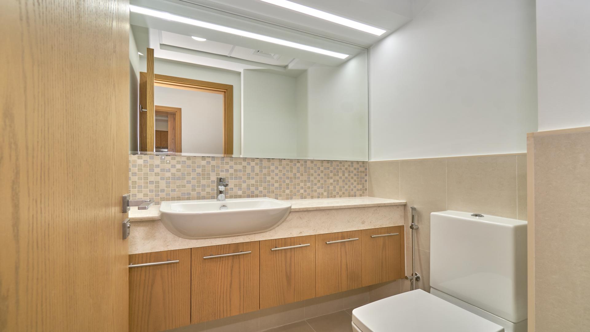 Modern living room with large windows in Bellevue Towers apartment, Downtown Dubai