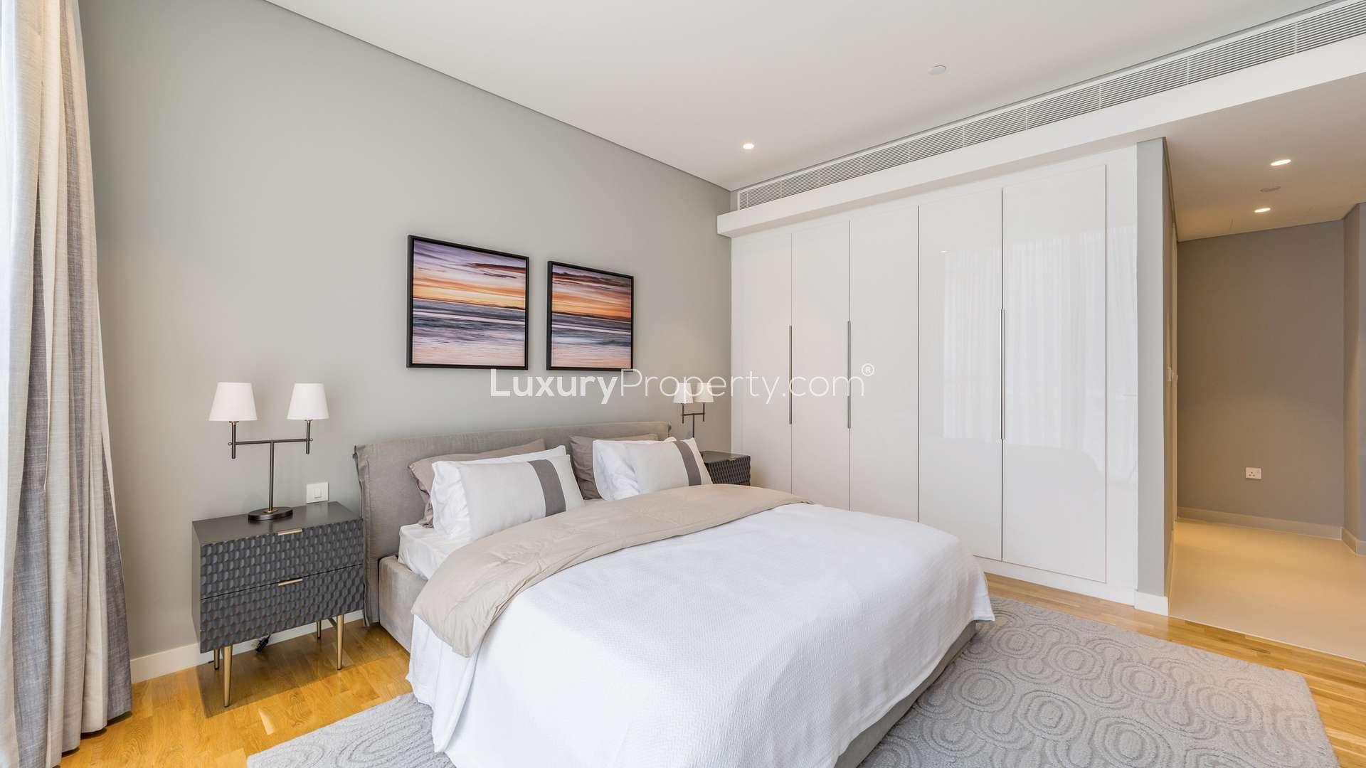 Luxury bathroom in Bluewaters one-bedroom apartment, featuring modern fixtures and elegant design