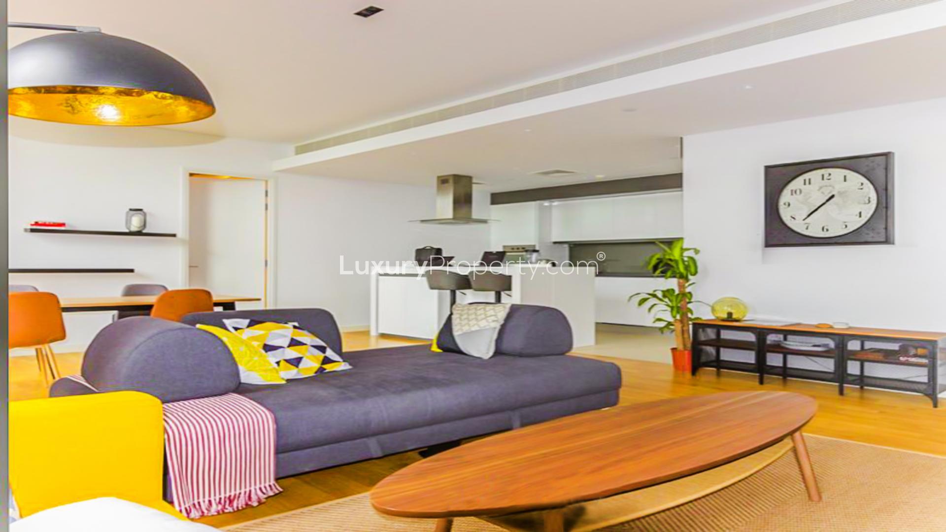 Fully furnished apartment living area with modern decor in Bluewaters Residences, ready to rent