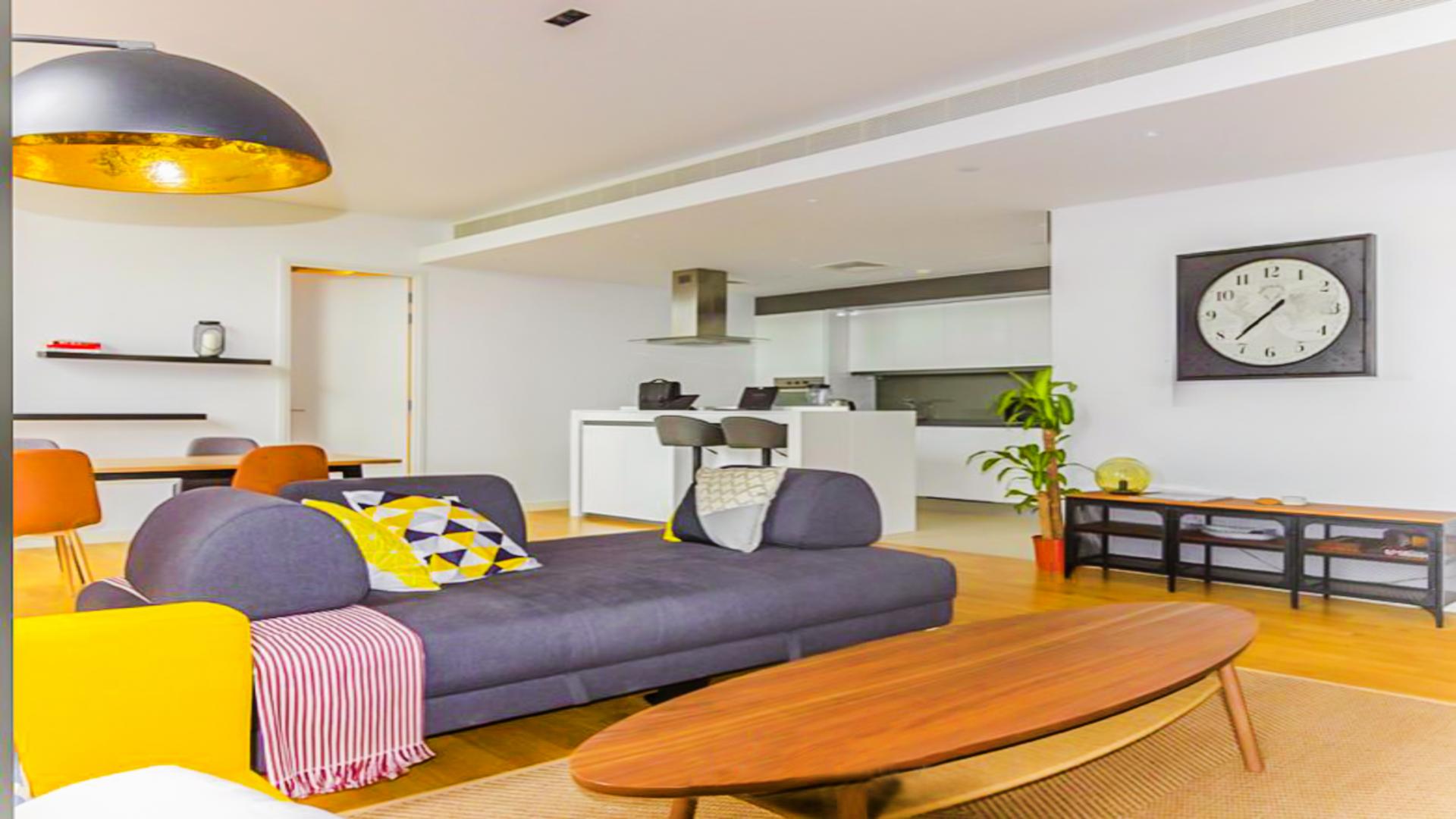 Fully furnished apartment living area with modern decor in Bluewaters Residences, ready to rent