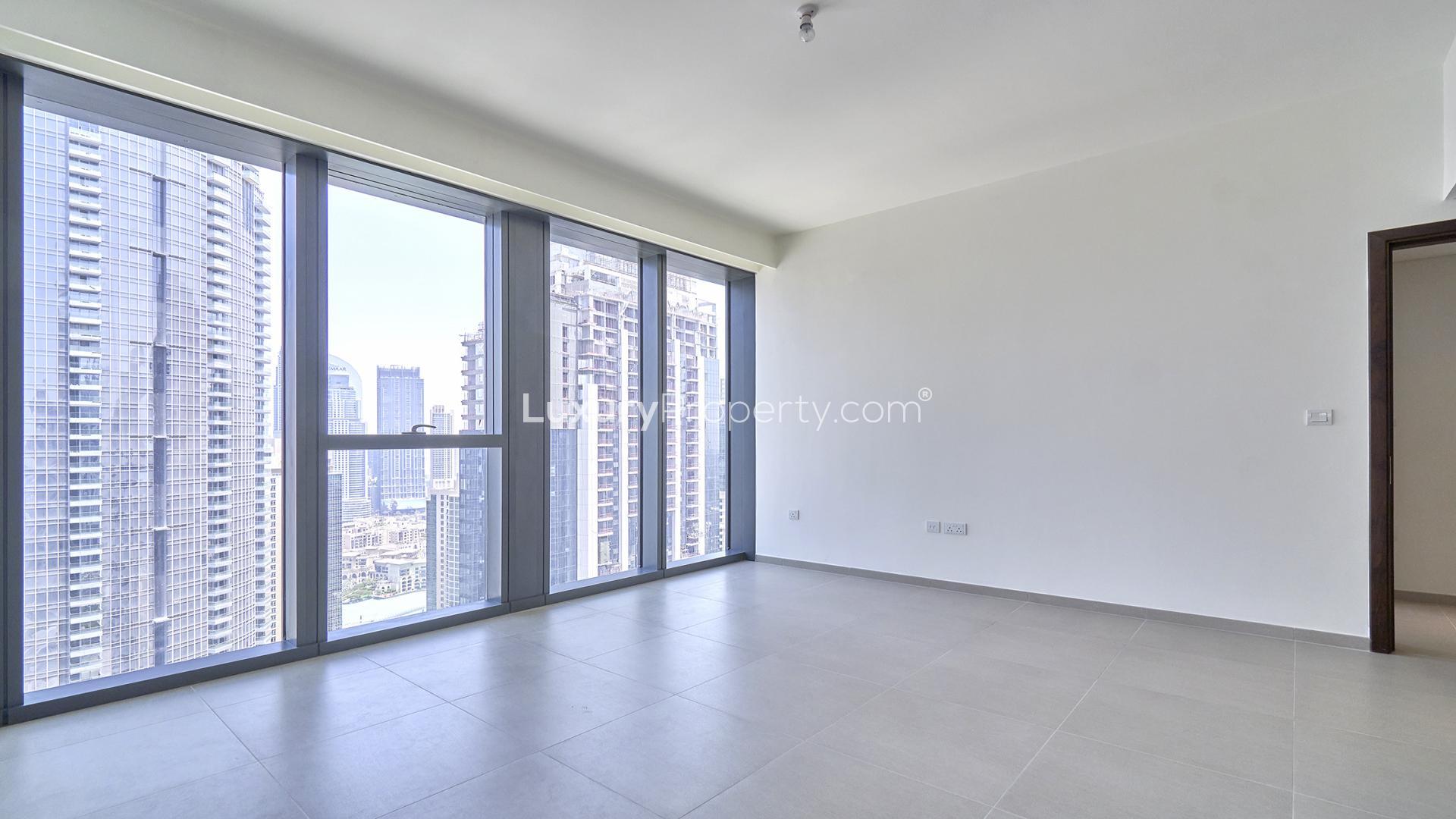 Empty apartment with large windows and city view in BLVD Heights, Downtown Dubai
