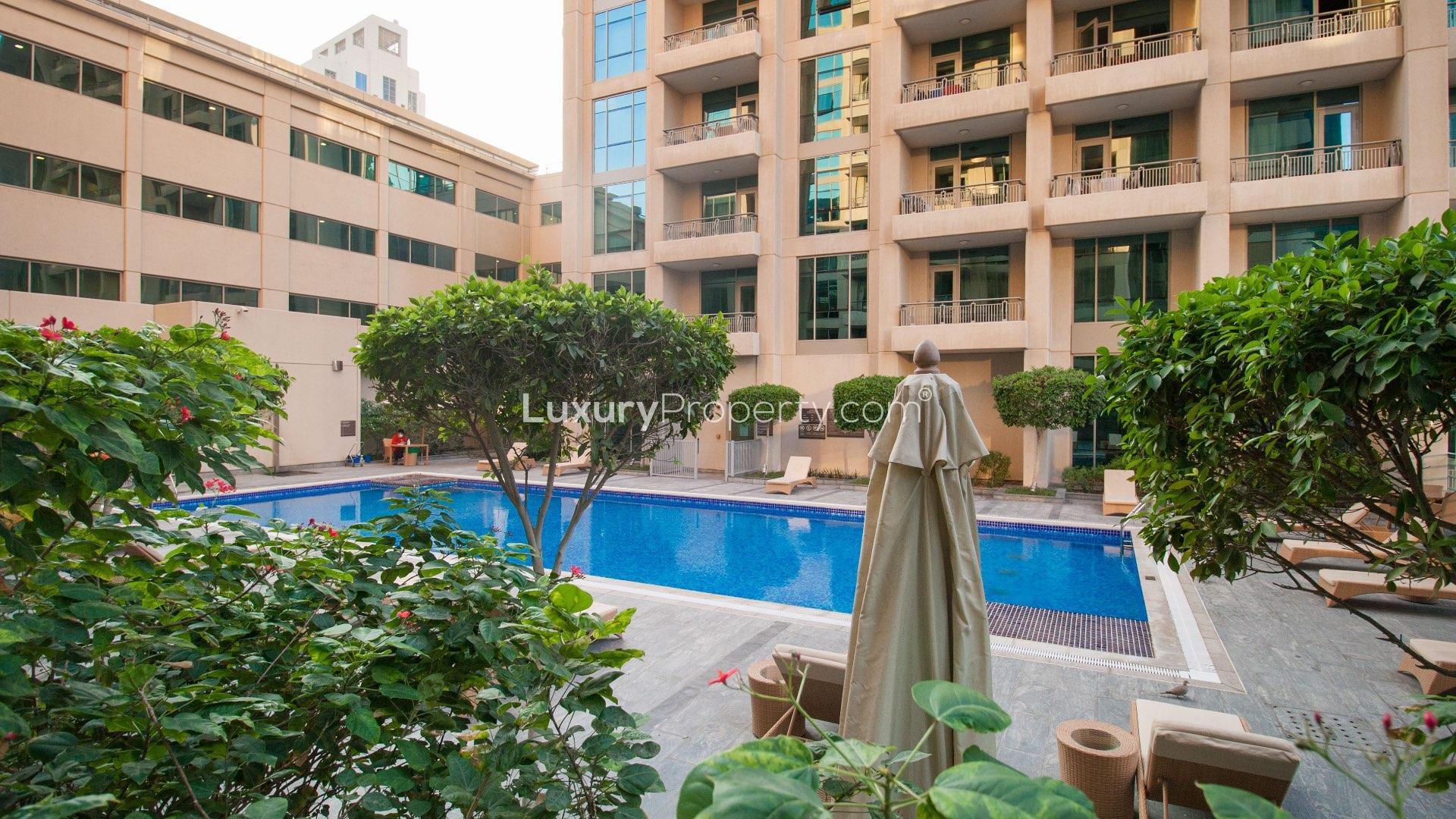 Outdoor pool view from apartment balcony in Downtown Dubai residential building
