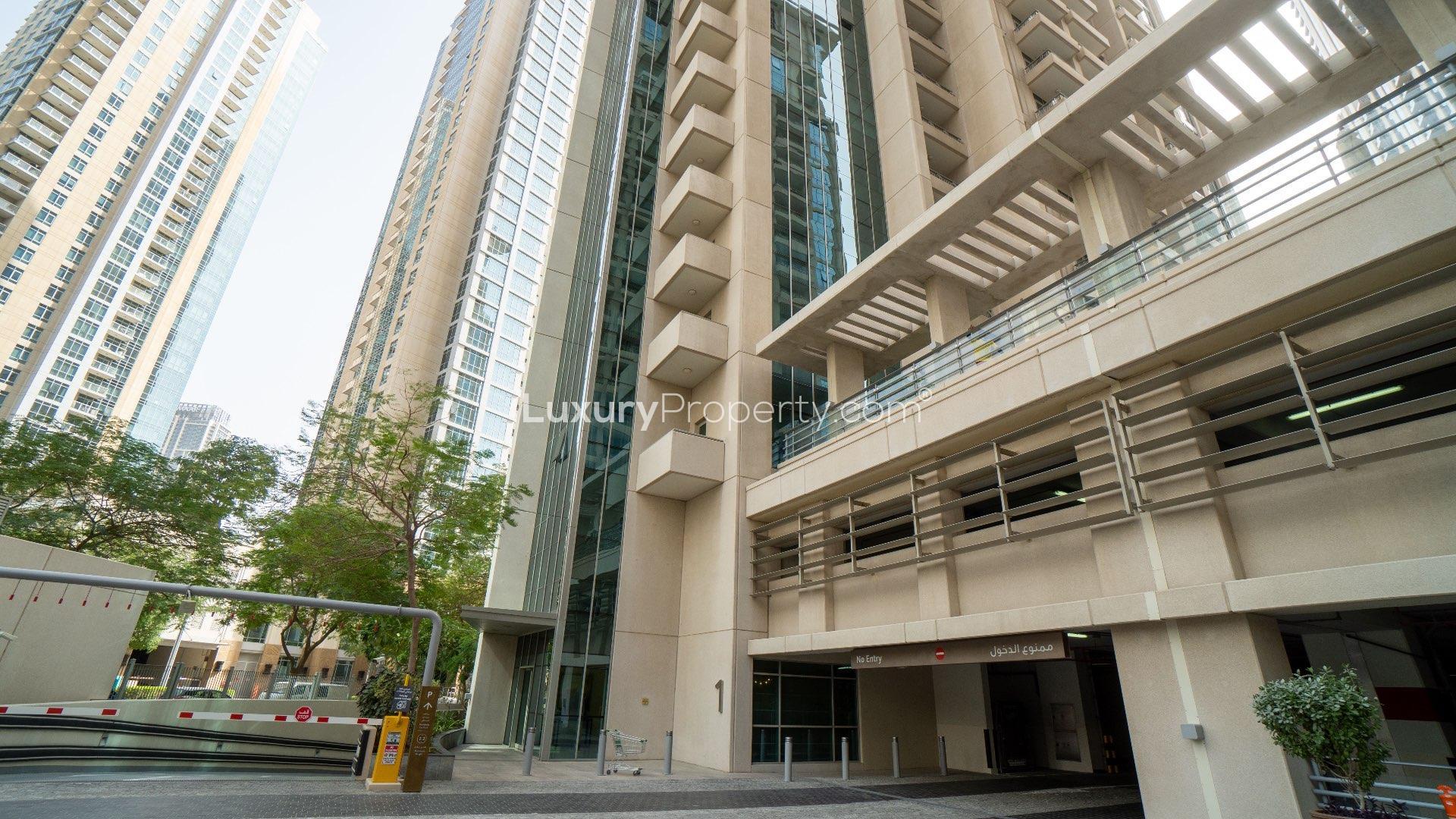 Outdoor swimming pool area at Downtown Dubai apartment complex for sale, LP11398